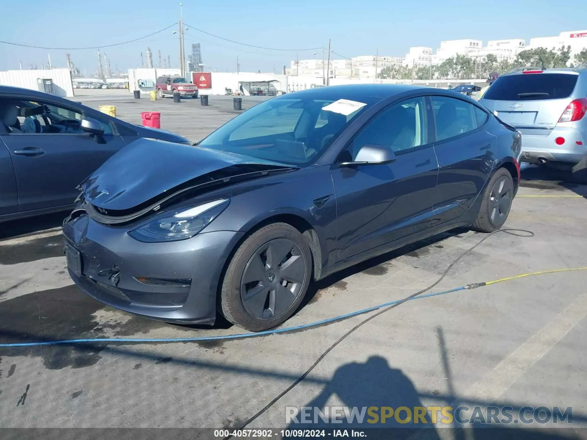 2 fotografías del automóvil dañado 5YJ3E1EA9PF408515 TESLA MODEL 3 2023