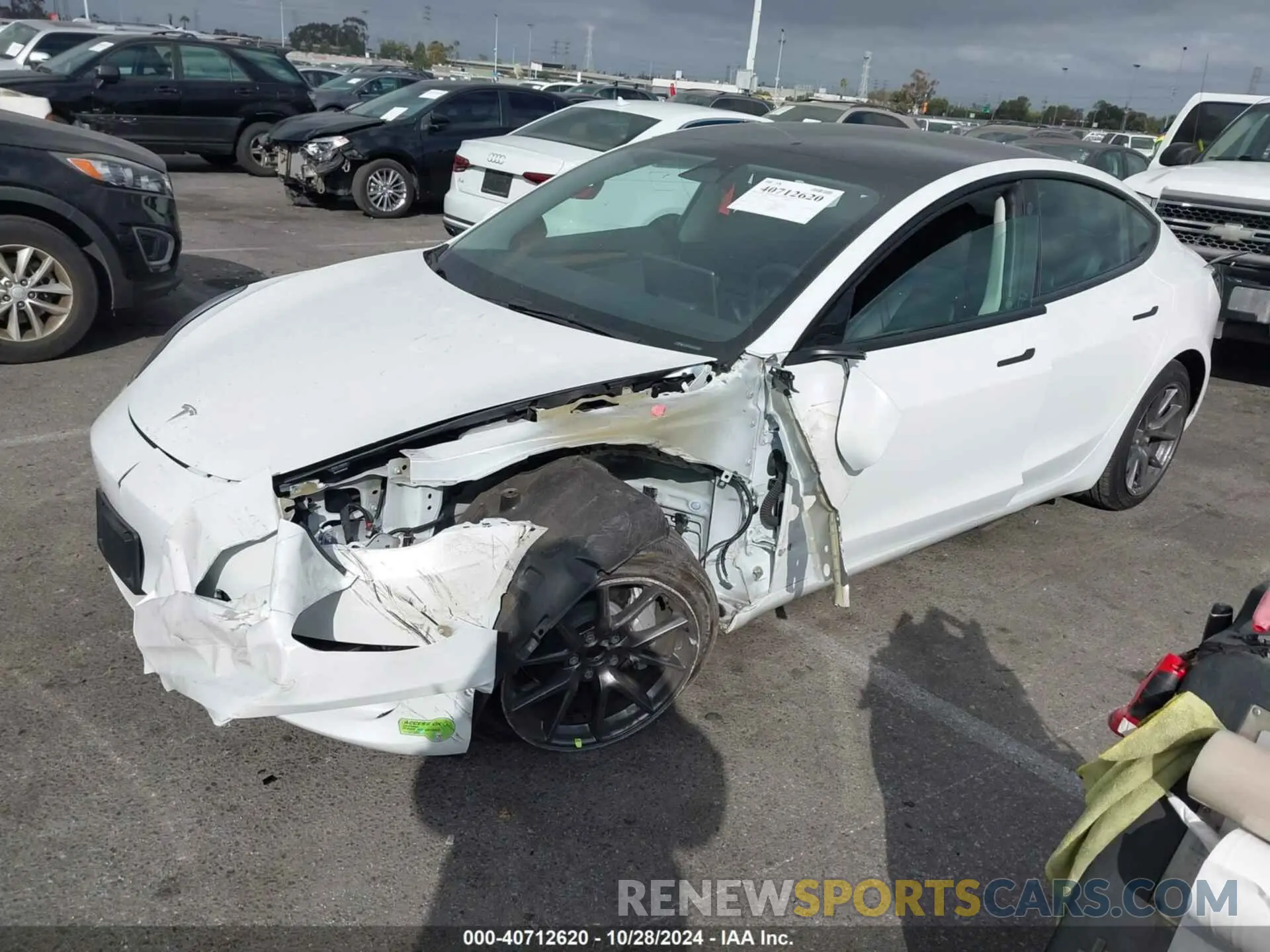 2 fotografías del automóvil dañado 5YJ3E1EA9PF460369 TESLA MODEL 3 2023