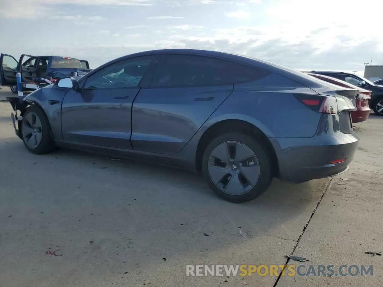 2 fotografías del automóvil dañado 5YJ3E1EA9PF470822 TESLA MODEL 3 2023