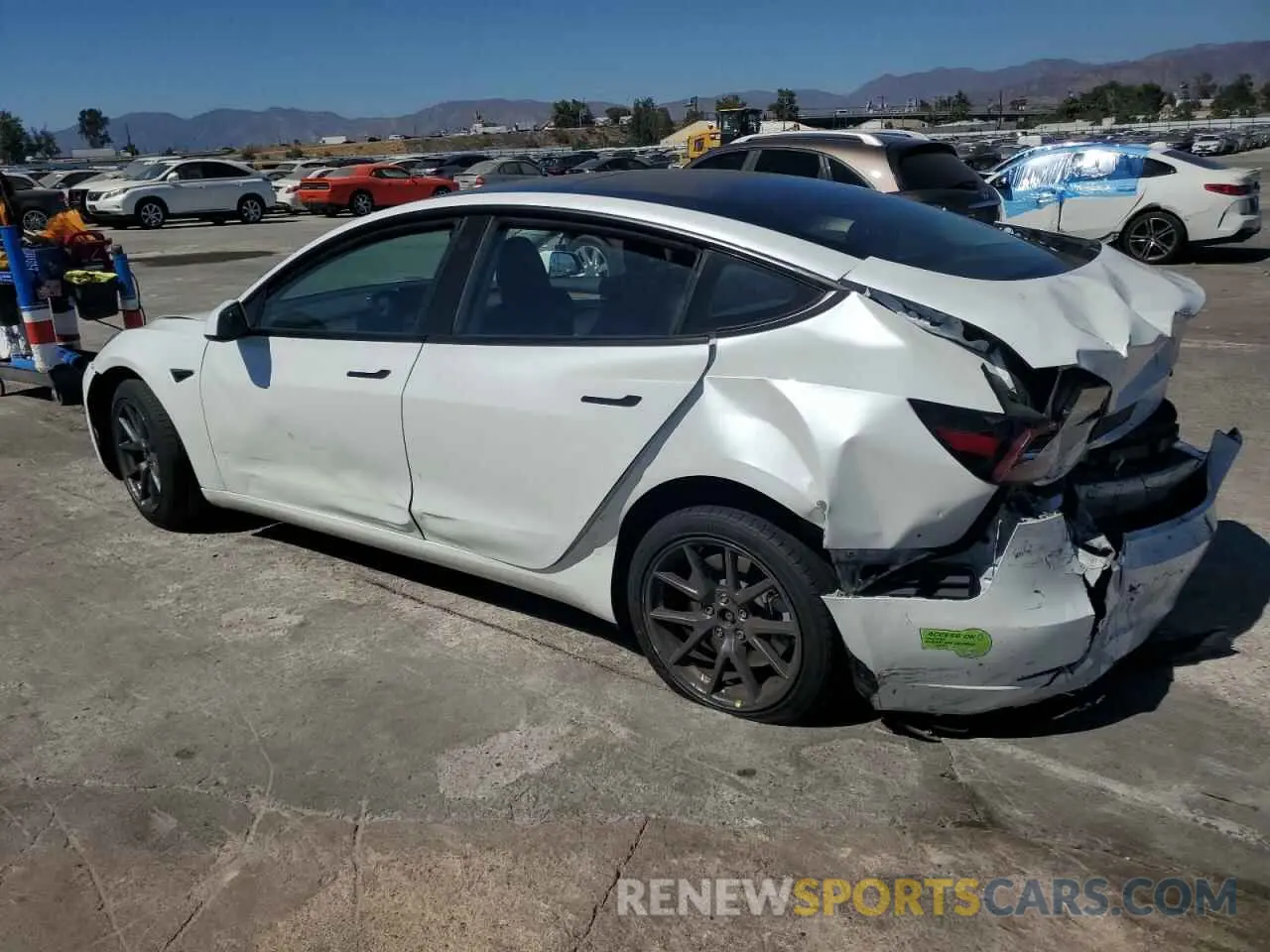 2 fotografías del automóvil dañado 5YJ3E1EA9PF491315 TESLA MODEL 3 2023