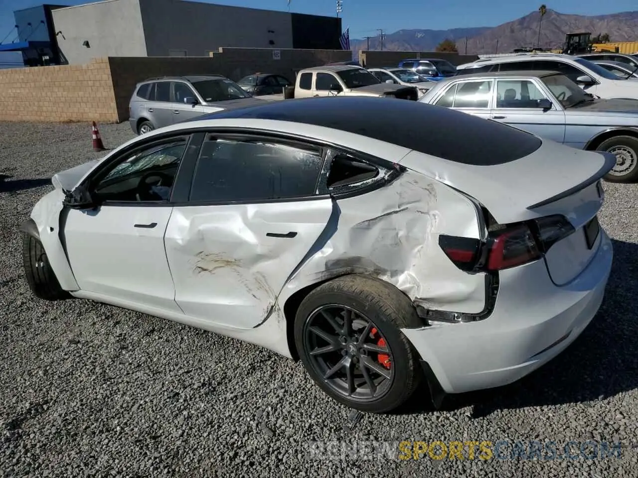 2 fotografías del automóvil dañado 5YJ3E1EA9PF506055 TESLA MODEL 3 2023