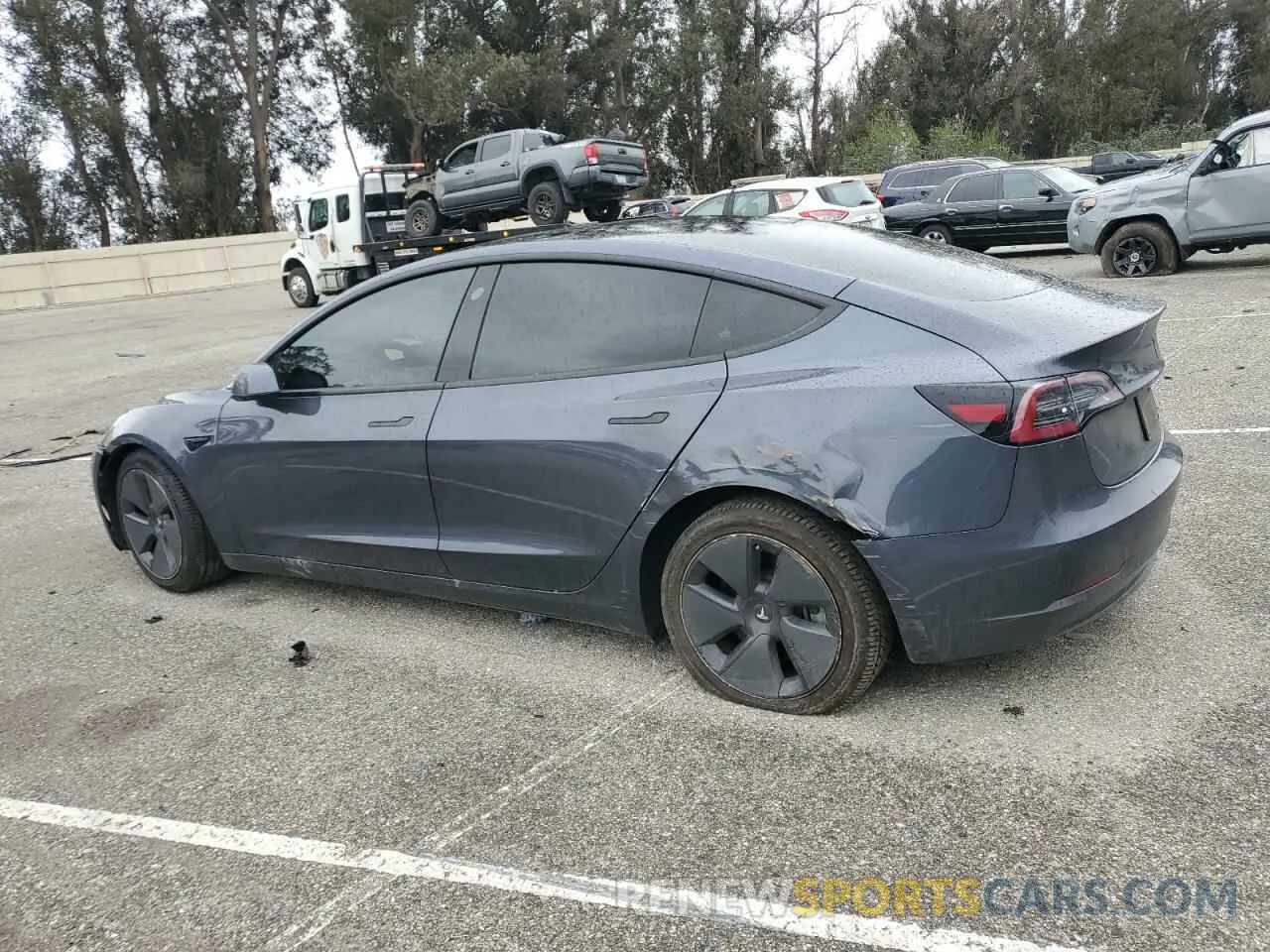 2 fotografías del automóvil dañado 5YJ3E1EA9PF543672 TESLA MODEL 3 2023