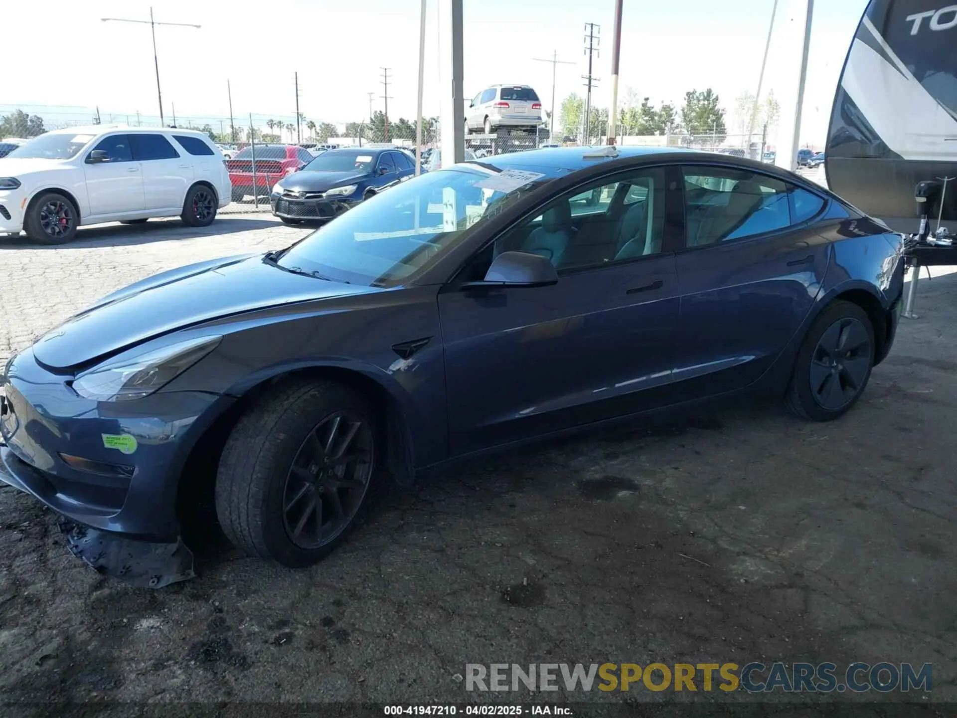 2 fotografías del automóvil dañado 5YJ3E1EA9PF560584 TESLA MODEL 3 2023