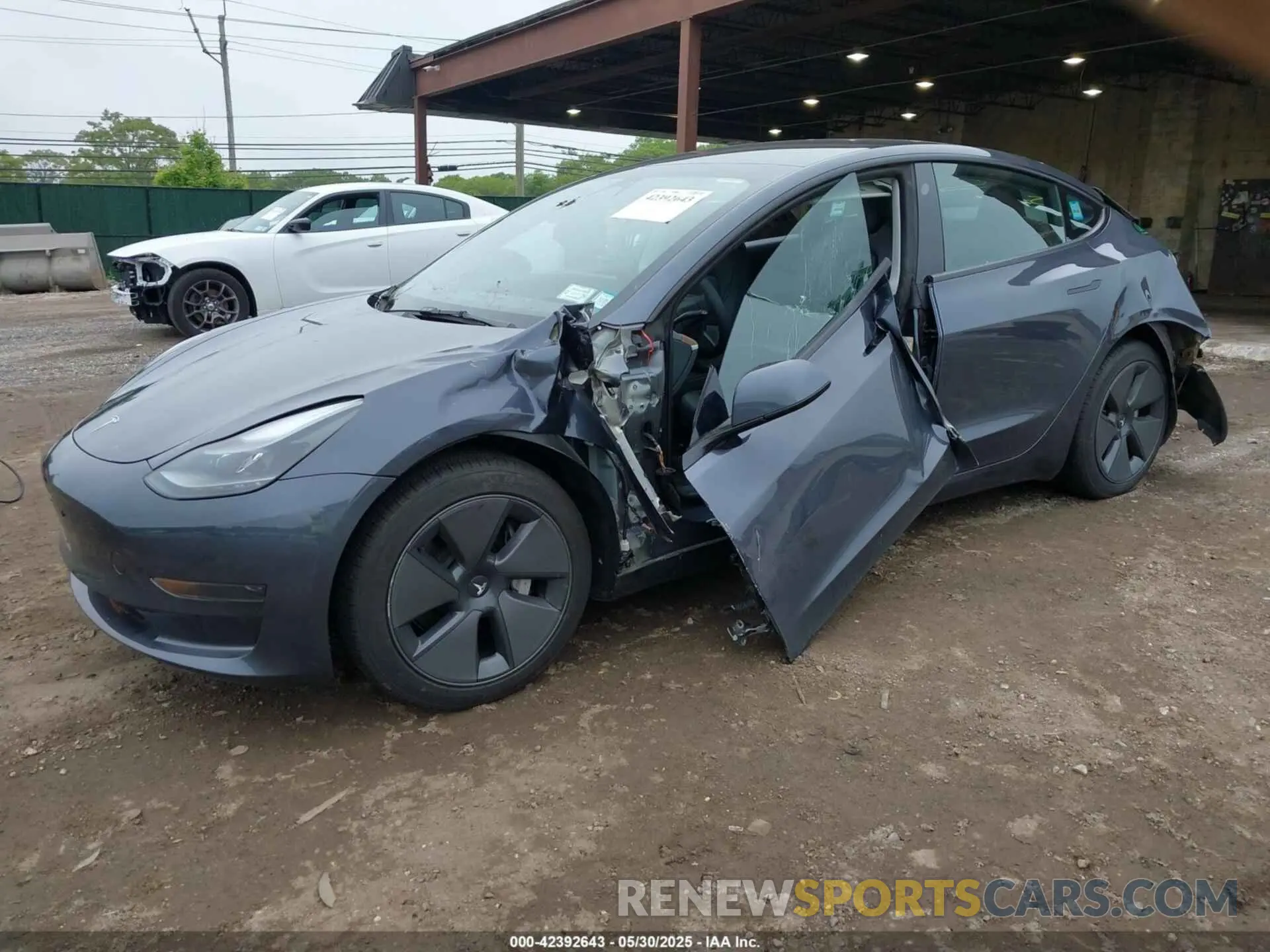 2 fotografías del automóvil dañado 5YJ3E1EA9PF673399 TESLA MODEL 3 2023