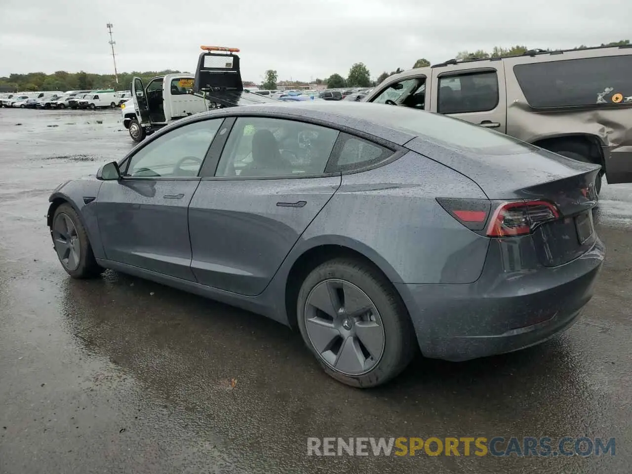 2 fotografías del automóvil dañado 5YJ3E1EA9PF699016 TESLA MODEL 3 2023