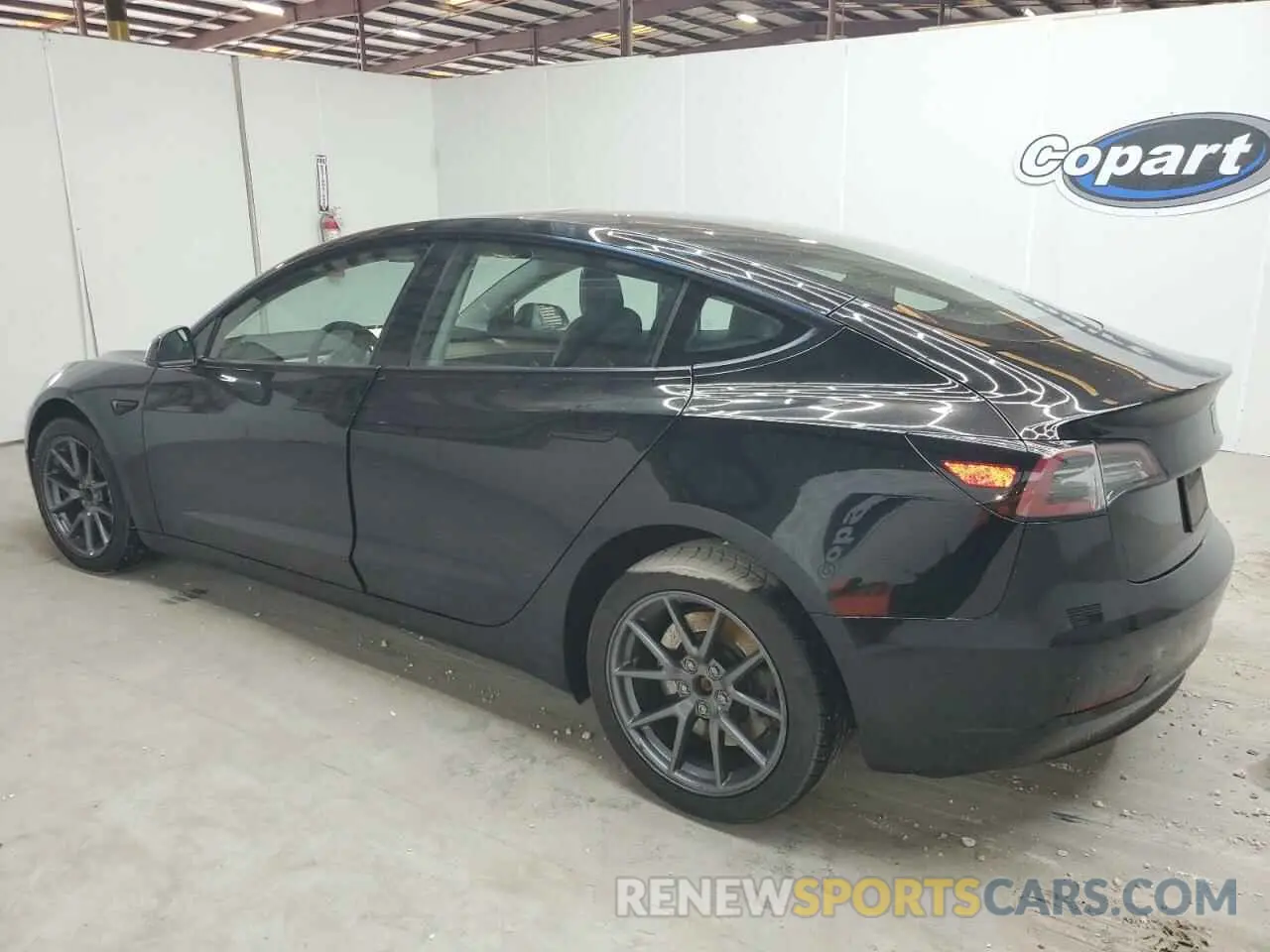 2 fotografías del automóvil dañado 5YJ3E1EAXPF453723 TESLA MODEL 3 2023