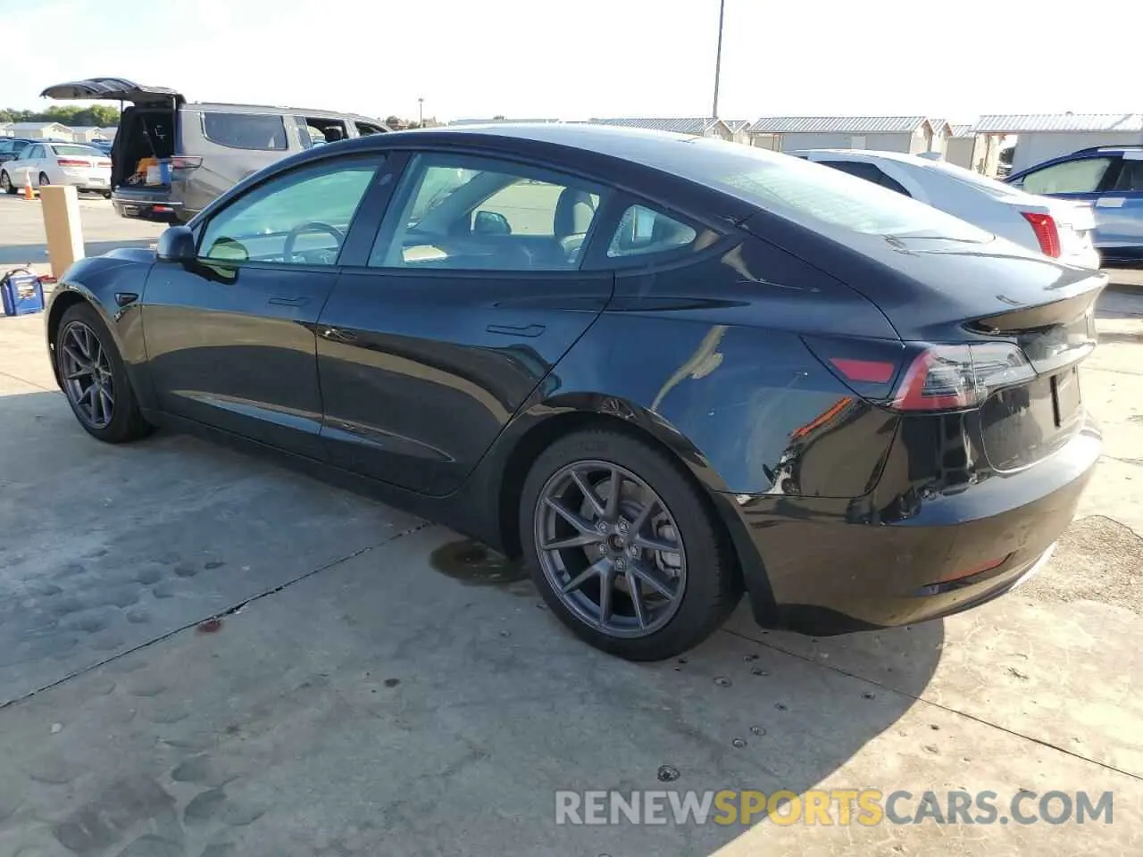 2 fotografías del automóvil dañado 5YJ3E1EAXPF501480 TESLA MODEL 3 2023