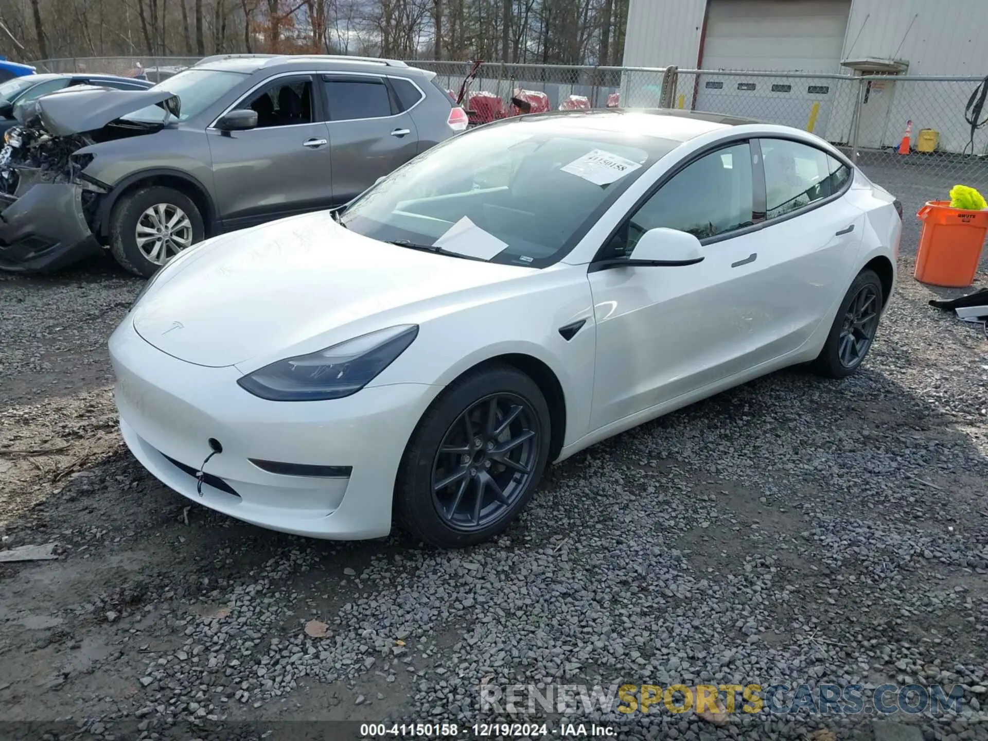 2 fotografías del automóvil dañado 5YJ3E1EAXPF543227 TESLA MODEL 3 2023