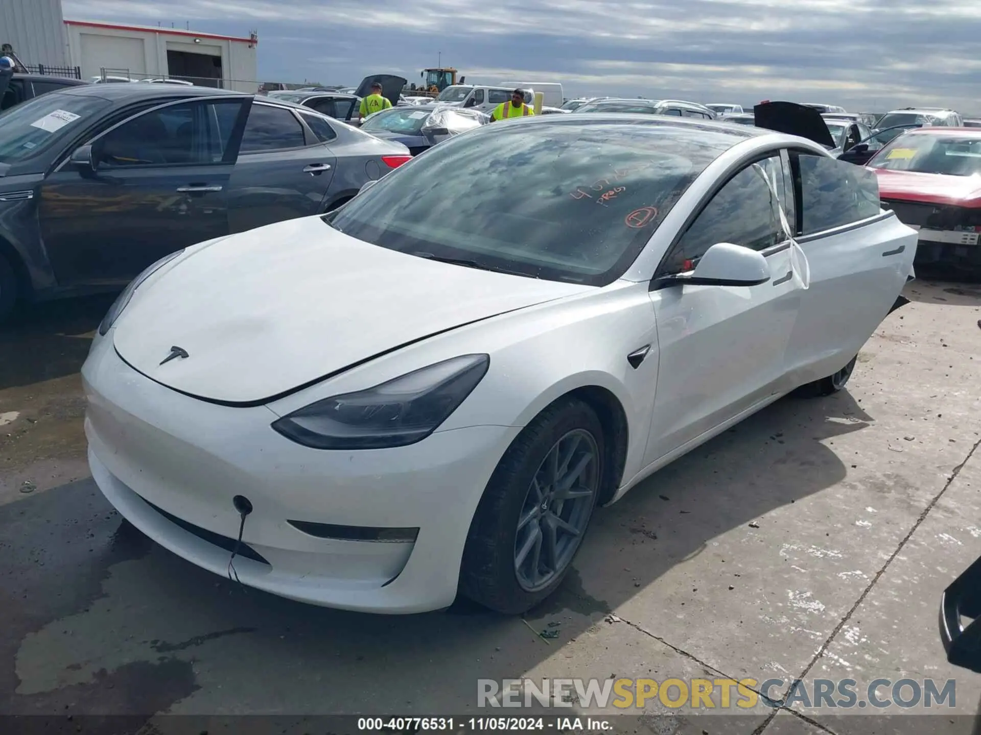 2 fotografías del automóvil dañado 5YJ3E1EAXPF568063 TESLA MODEL 3 2023