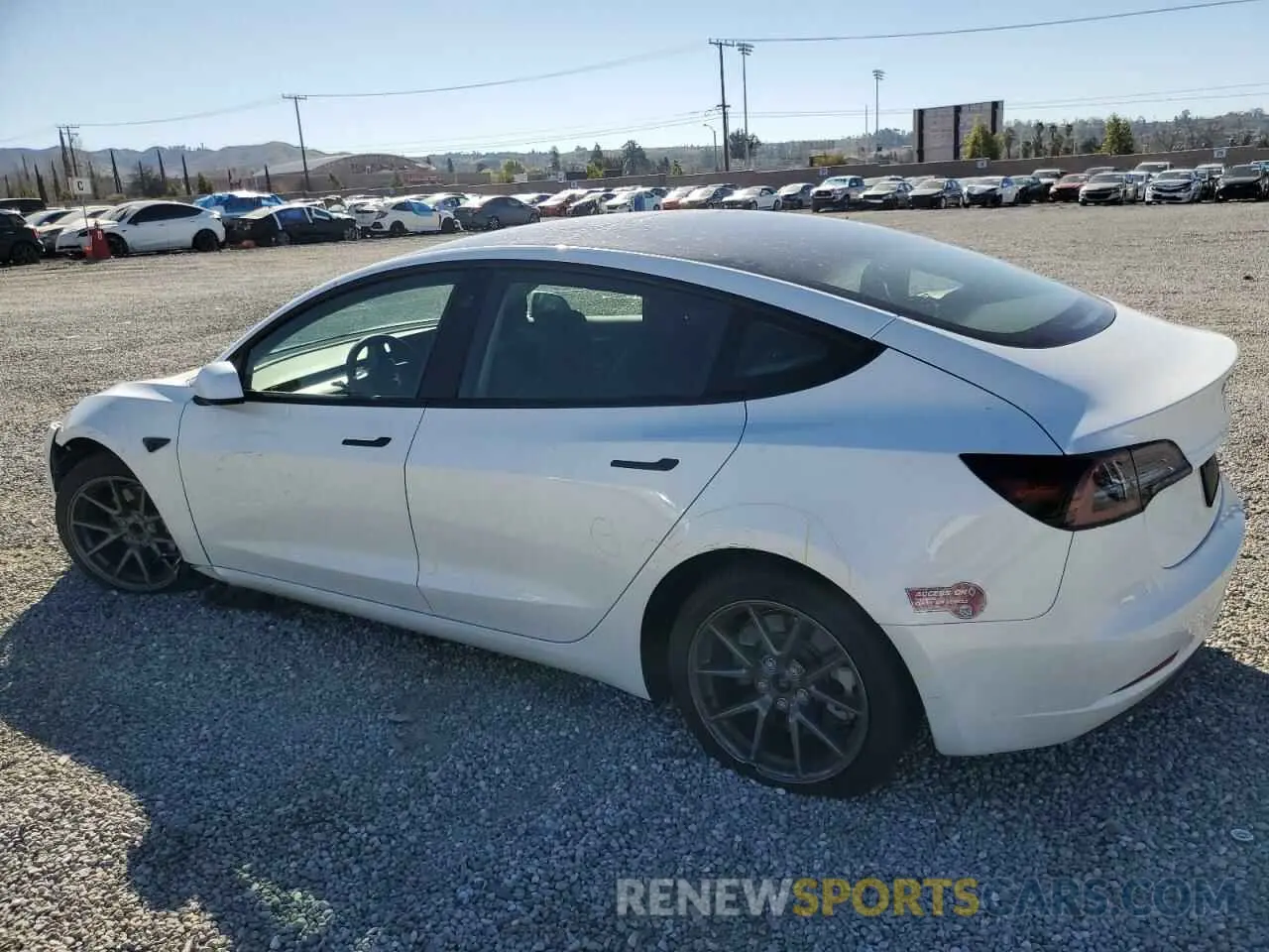 2 fotografías del automóvil dañado 5YJ3E1EAXPF571822 TESLA MODEL 3 2023