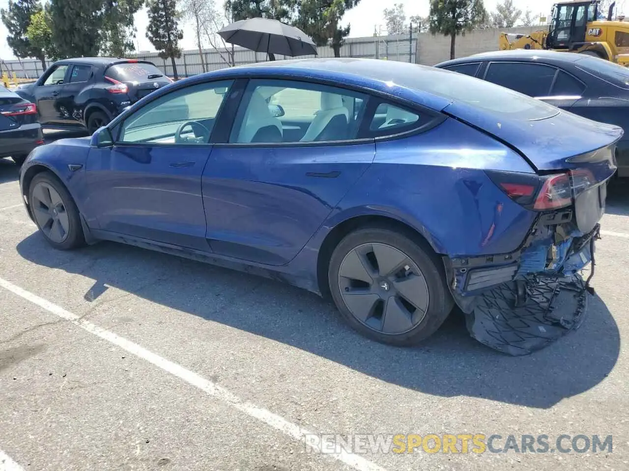 2 fotografías del automóvil dañado 5YJ3E1EAXPF599412 TESLA MODEL 3 2023