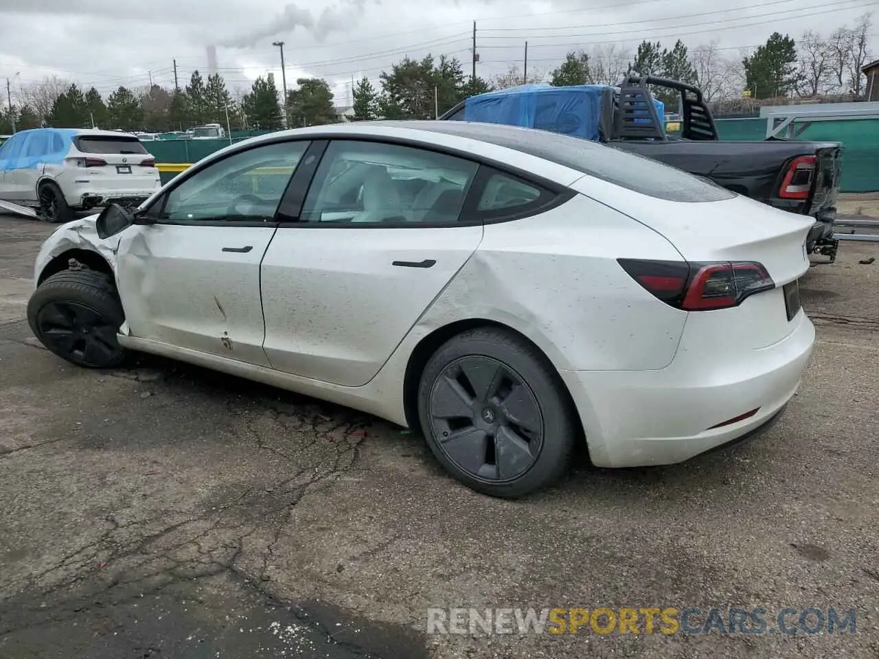 2 fotografías del automóvil dañado 5YJ3E1EAXPF600008 TESLA MODEL 3 2023