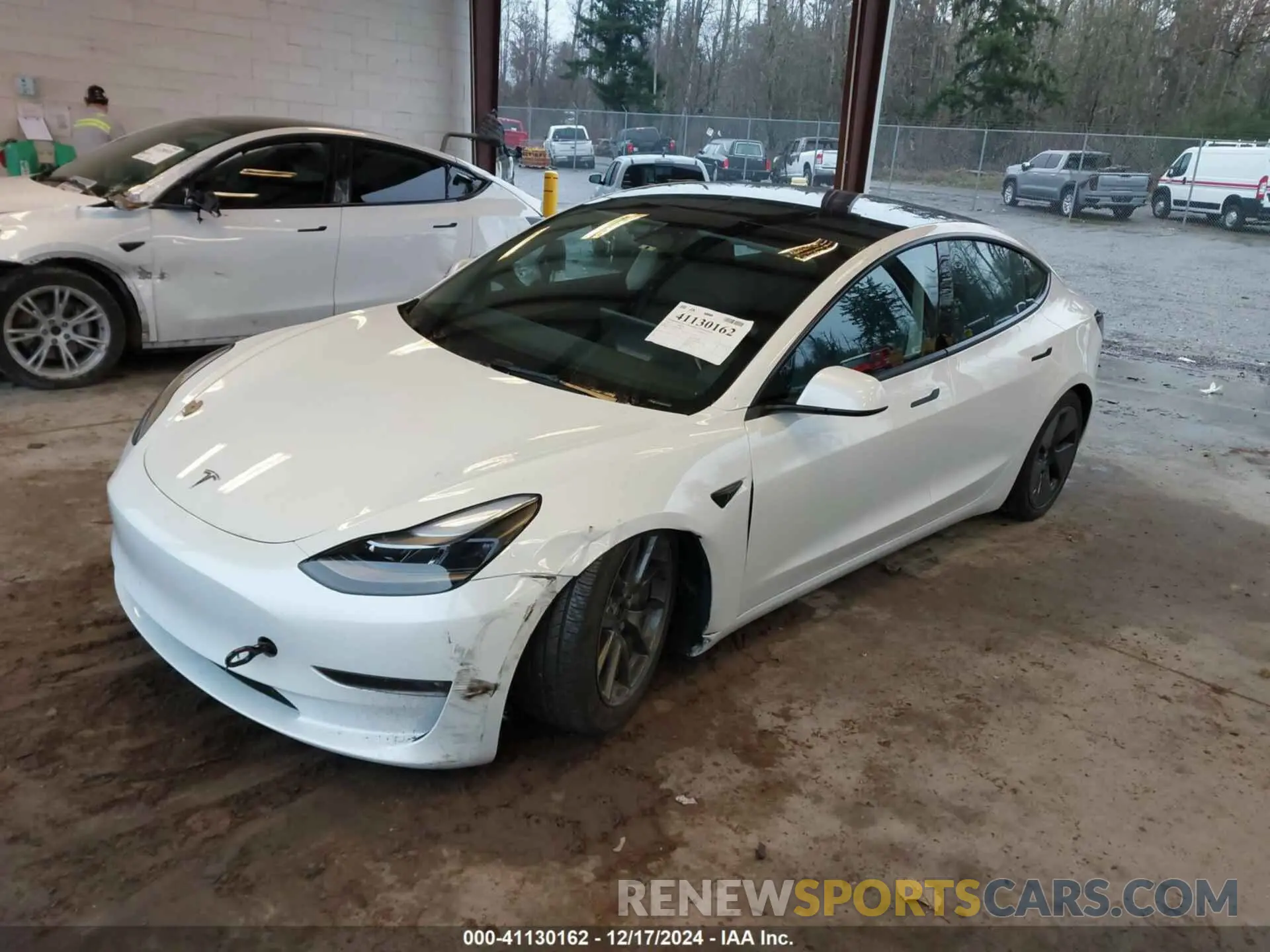 2 fotografías del automóvil dañado 5YJ3E1EB0PF604464 TESLA MODEL 3 2023