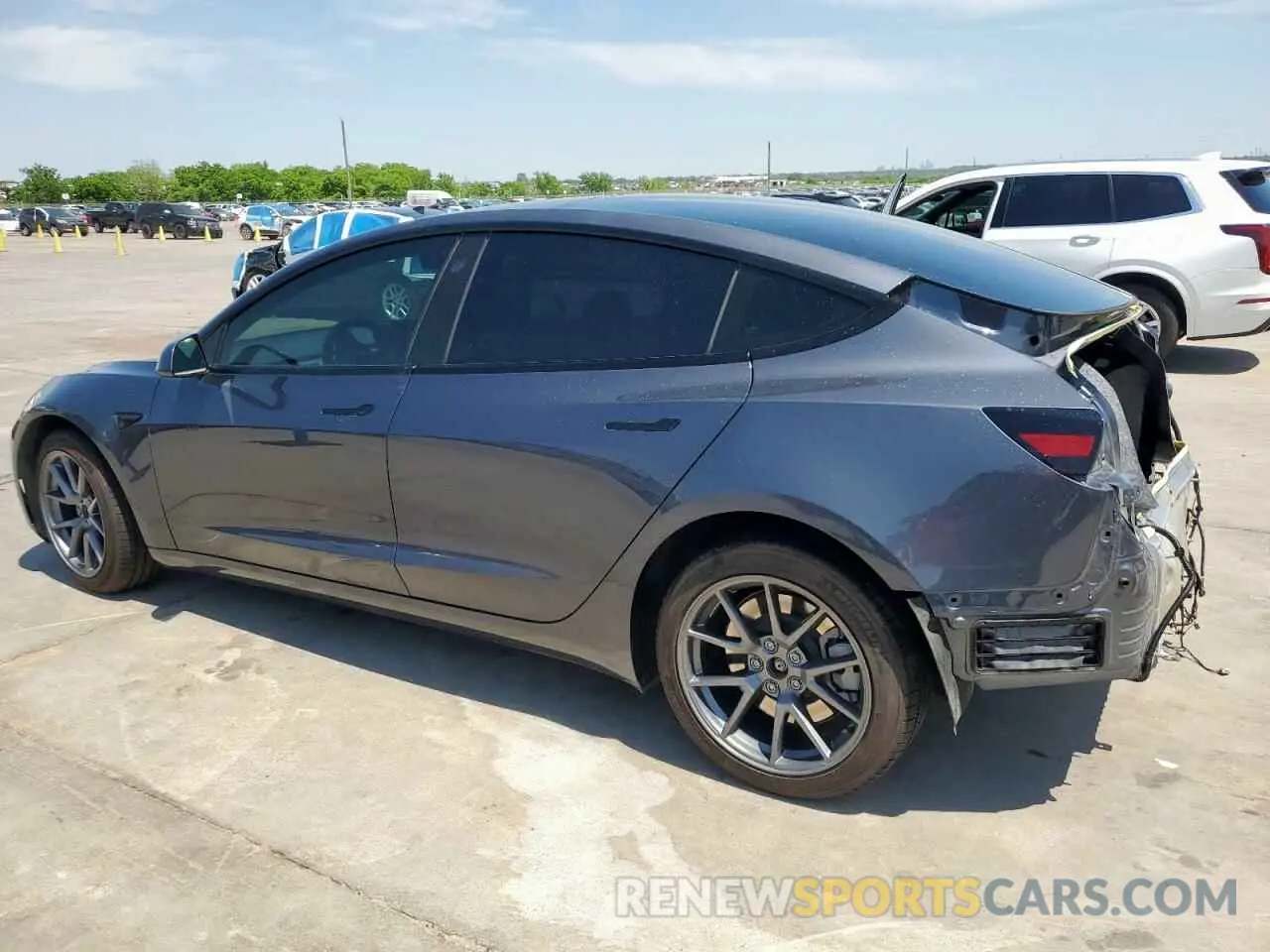 2 fotografías del automóvil dañado 5YJ3E1EB1PF390262 TESLA MODEL 3 2023