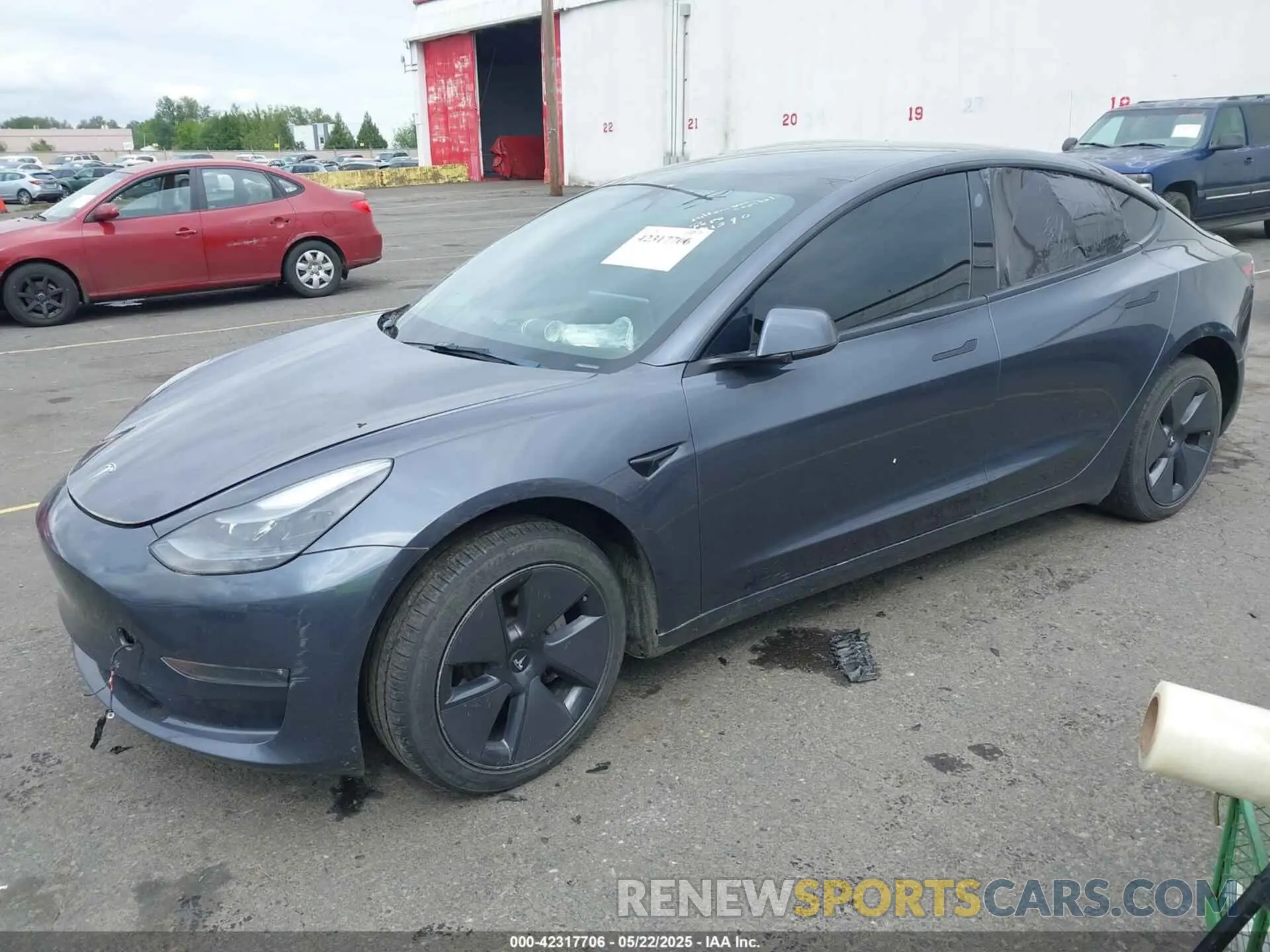 2 fotografías del automóvil dañado 5YJ3E1EB1PF391590 TESLA MODEL 3 2023