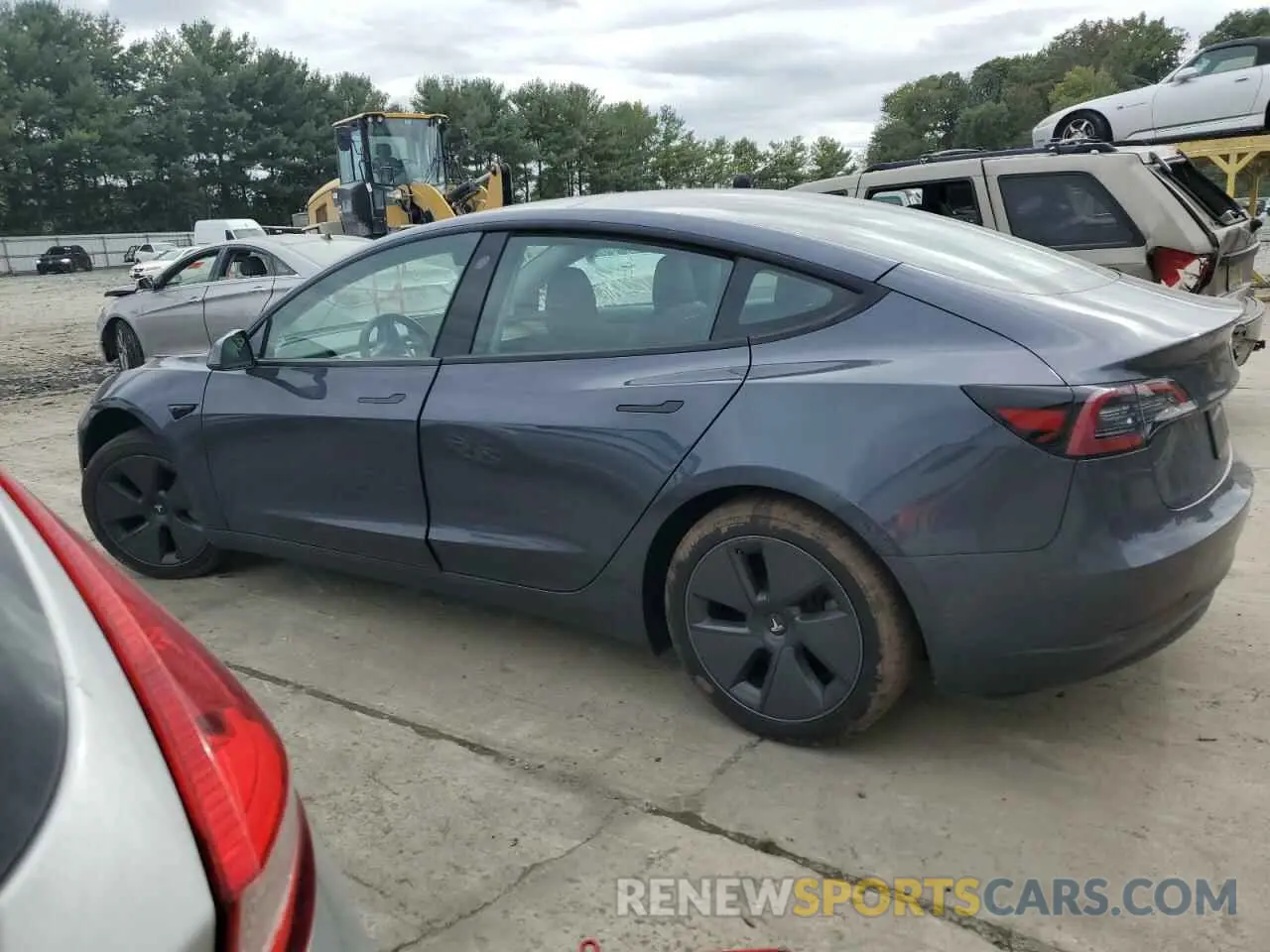 2 fotografías del automóvil dañado 5YJ3E1EB1PF634072 TESLA MODEL 3 2023
