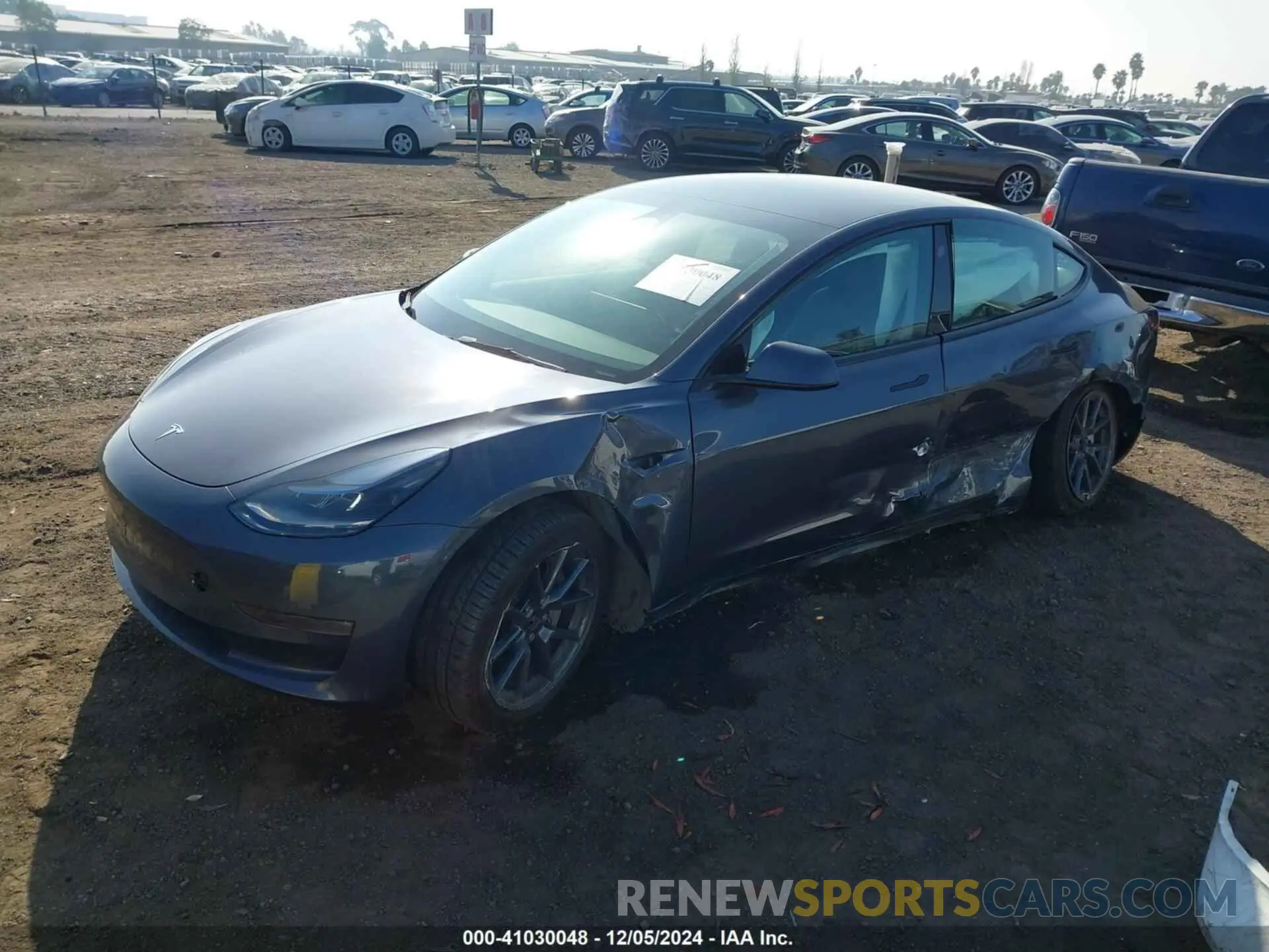 2 fotografías del automóvil dañado 5YJ3E1EB1PF661319 TESLA MODEL 3 2023
