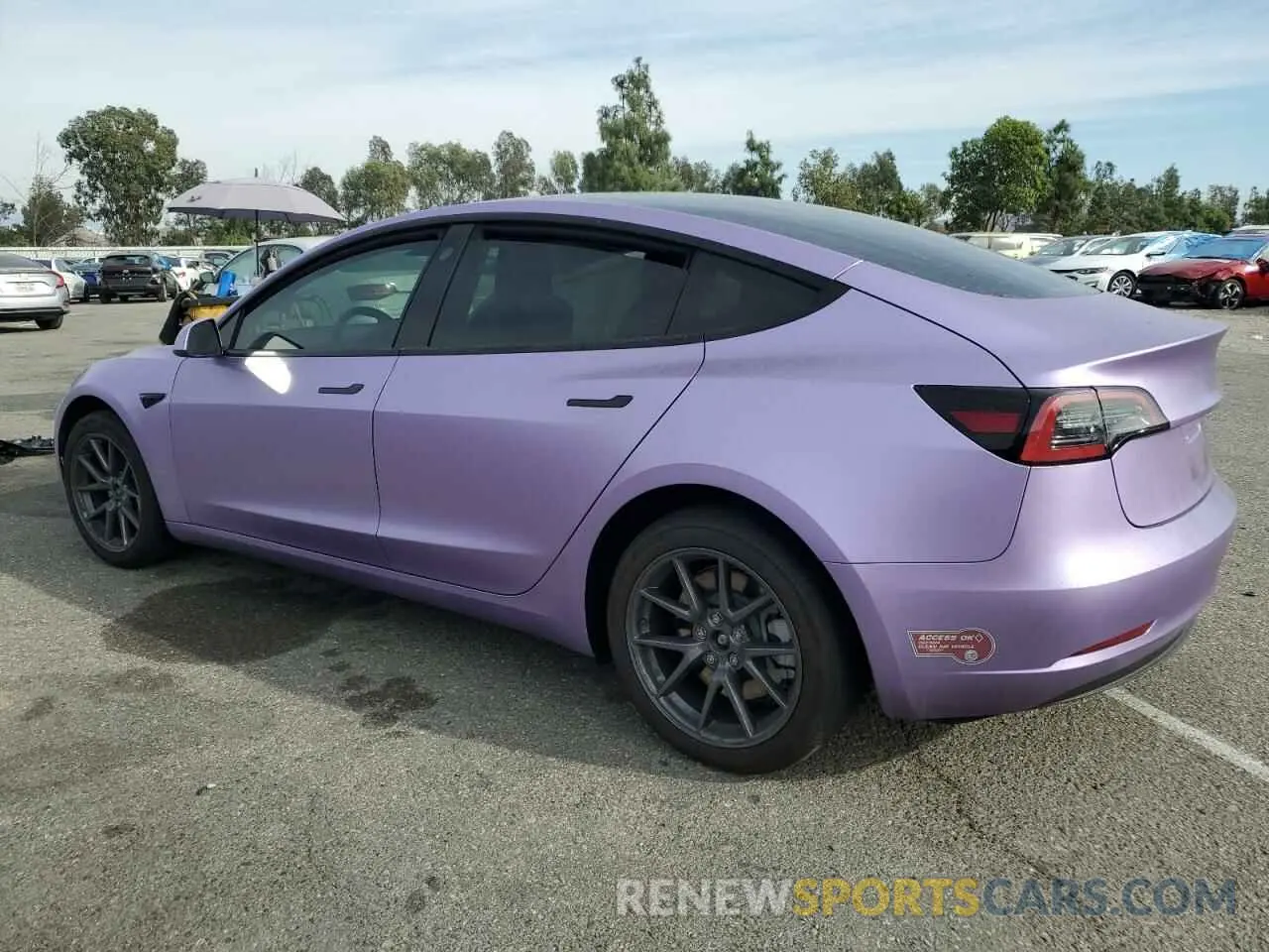 2 fotografías del automóvil dañado 5YJ3E1EB2PF660065 TESLA MODEL 3 2023