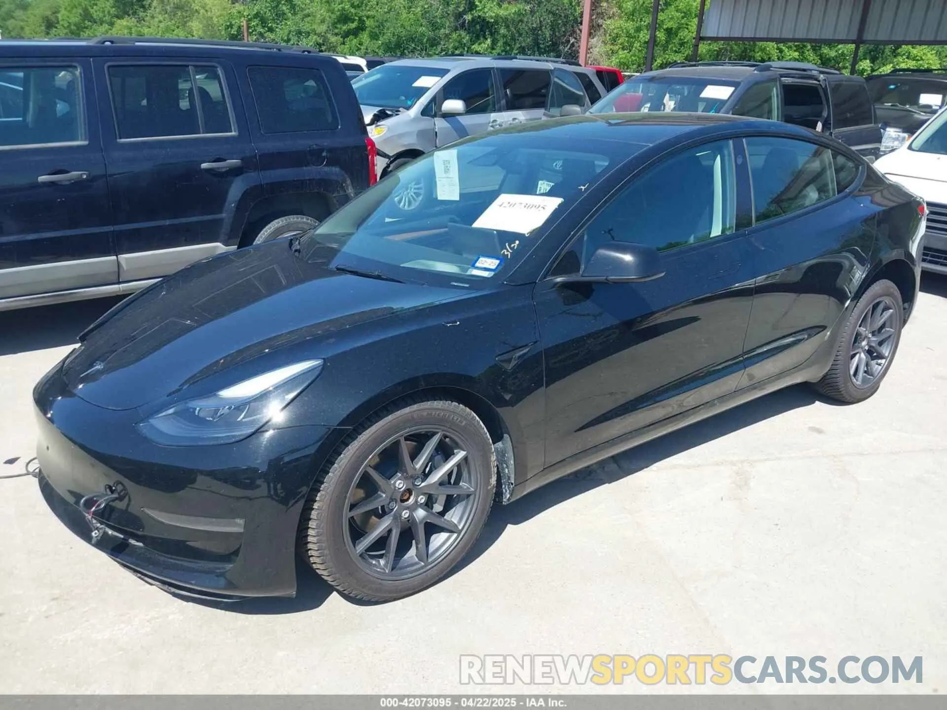 2 fotografías del automóvil dañado 5YJ3E1EB2PF688173 TESLA MODEL 3 2023