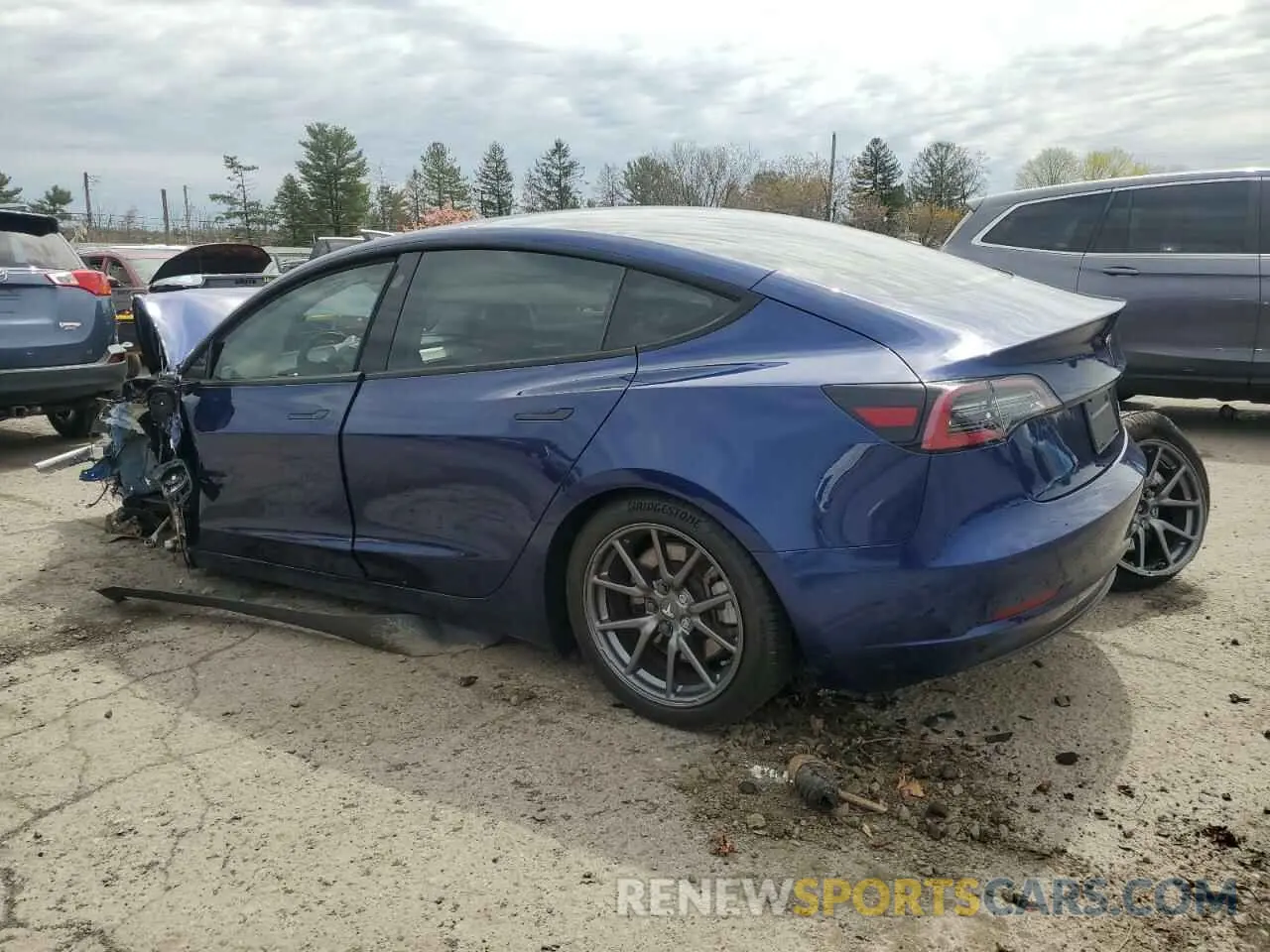 2 fotografías del automóvil dañado 5YJ3E1EB3PF390263 TESLA MODEL 3 2023