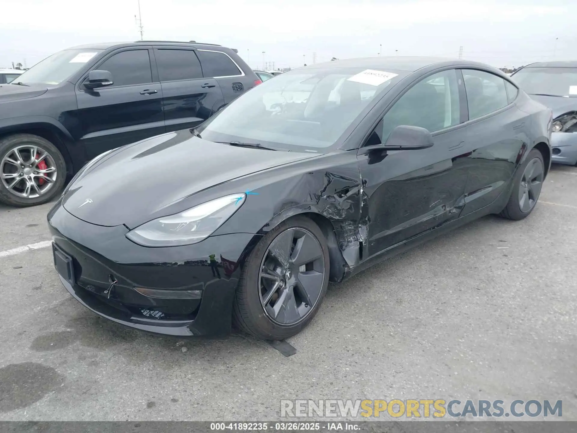 2 fotografías del automóvil dañado 5YJ3E1EB3PF390540 TESLA MODEL 3 2023