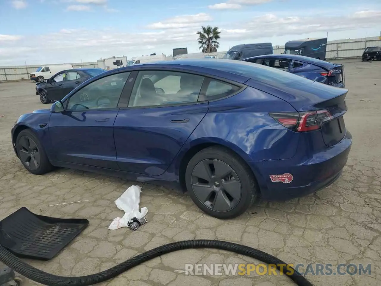 2 fotografías del automóvil dañado 5YJ3E1EB4PF704079 TESLA MODEL 3 2023