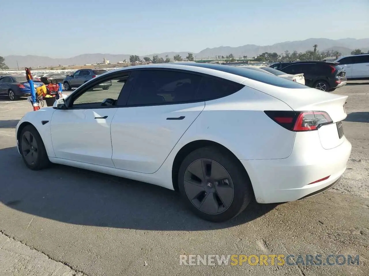 2 fotografías del automóvil dañado 5YJ3E1EB5PF712336 TESLA MODEL 3 2023