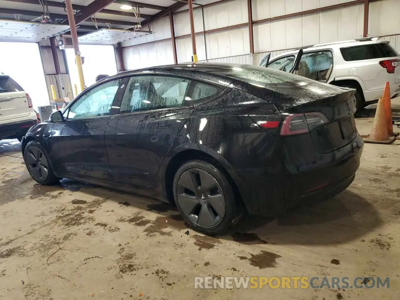 2 fotografías del automóvil dañado 5YJ3E1EB6PF466252 TESLA MODEL 3 2023