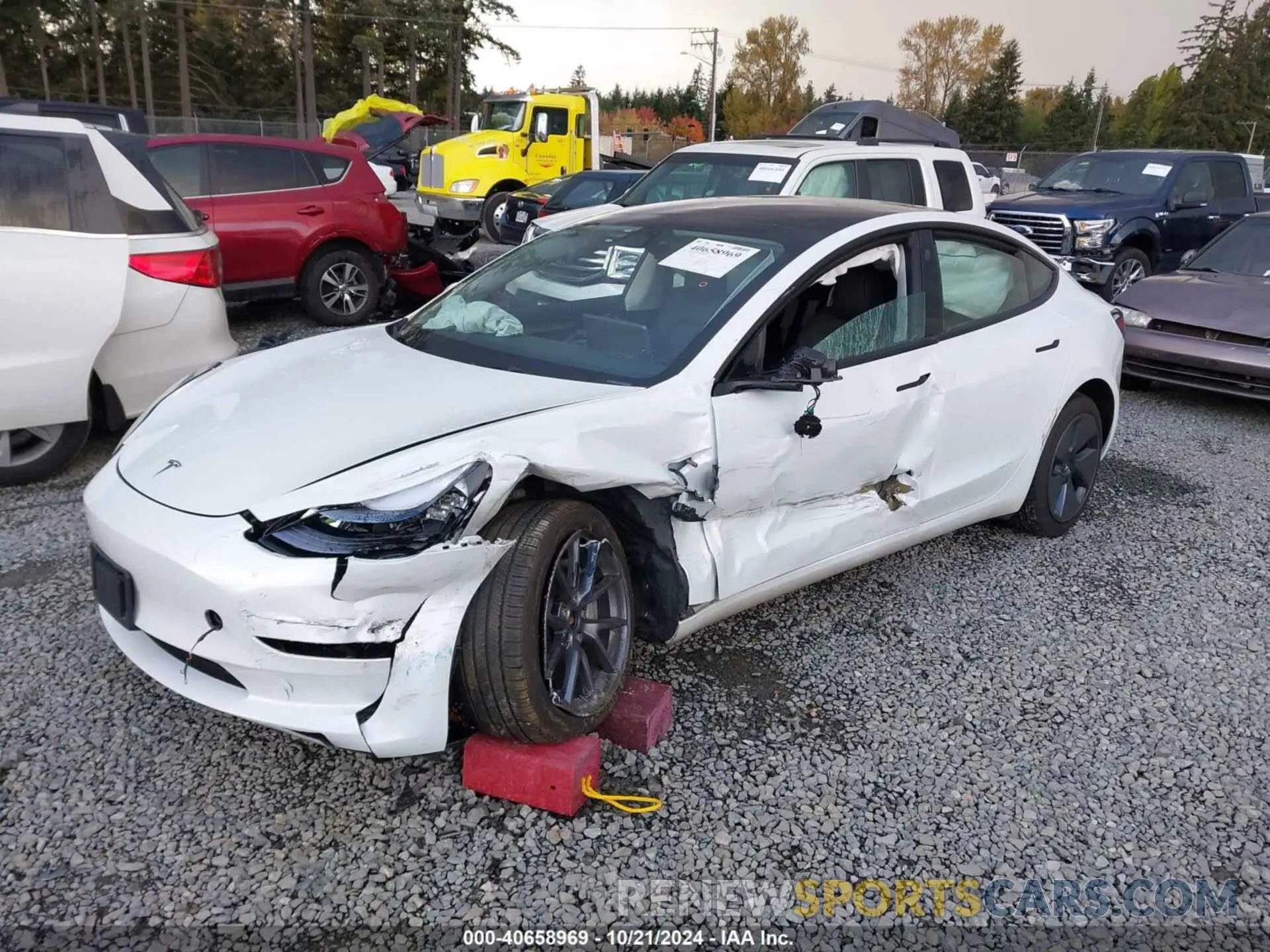 2 fotografías del automóvil dañado 5YJ3E1EB7PF603408 TESLA MODEL 3 2023