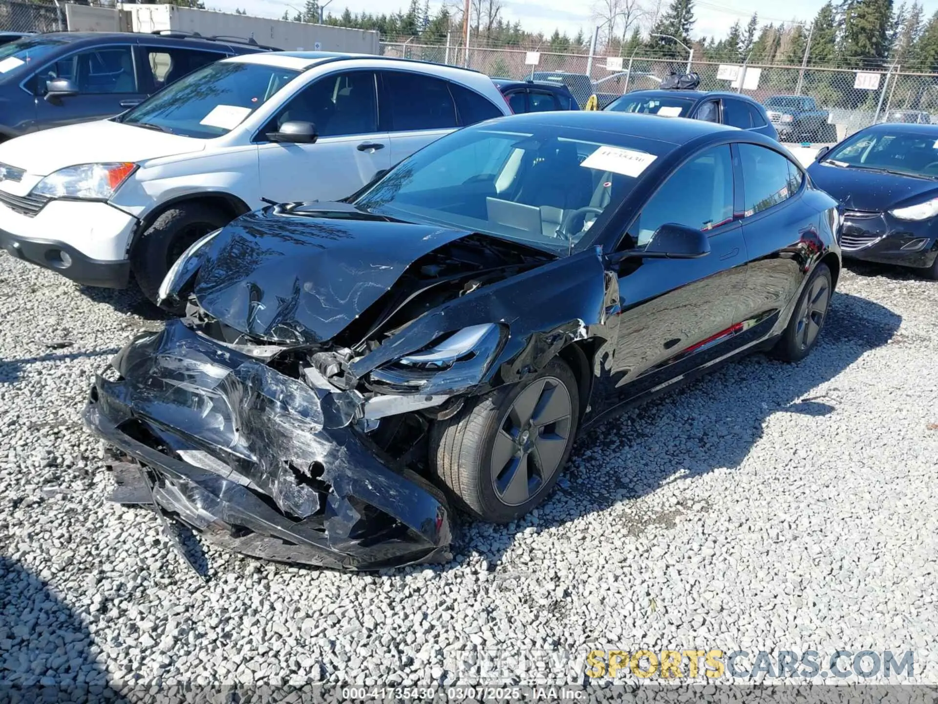 2 fotografías del automóvil dañado 5YJ3E1EB7PF657274 TESLA MODEL 3 2023