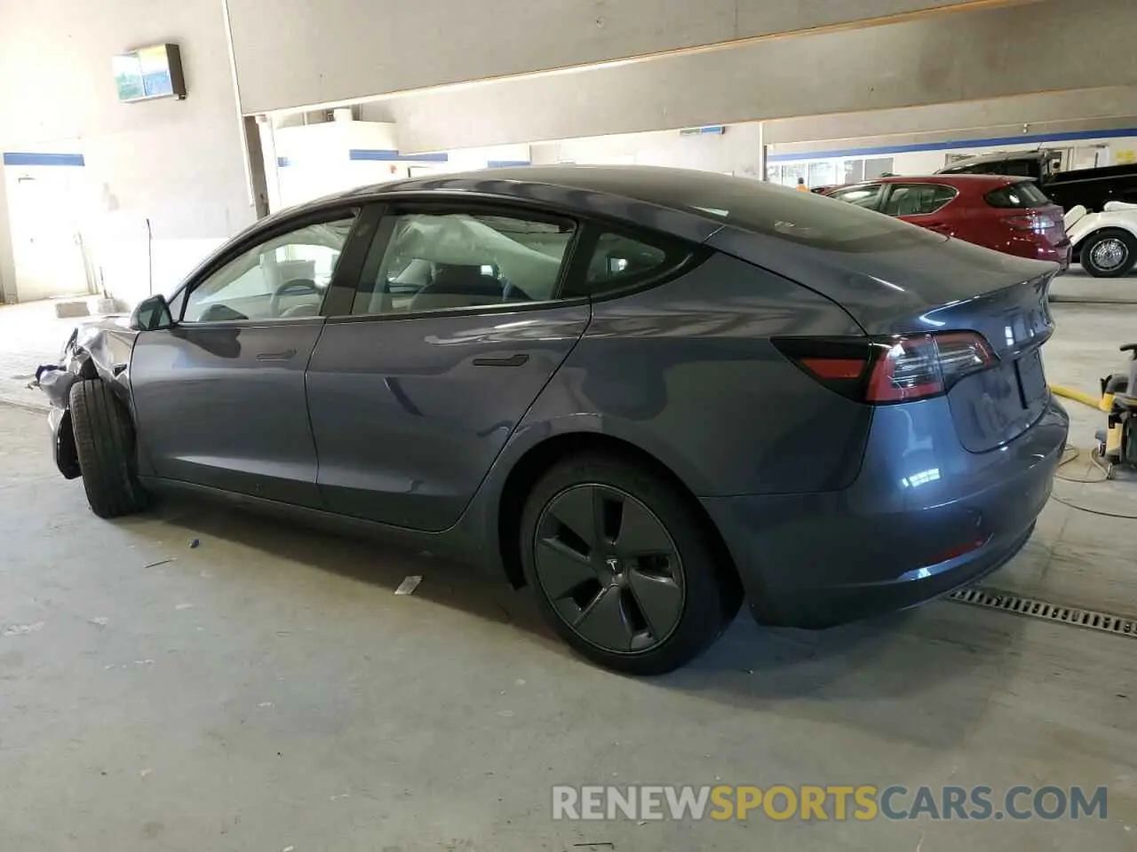 2 fotografías del automóvil dañado 5YJ3E1EB9PF392647 TESLA MODEL 3 2023