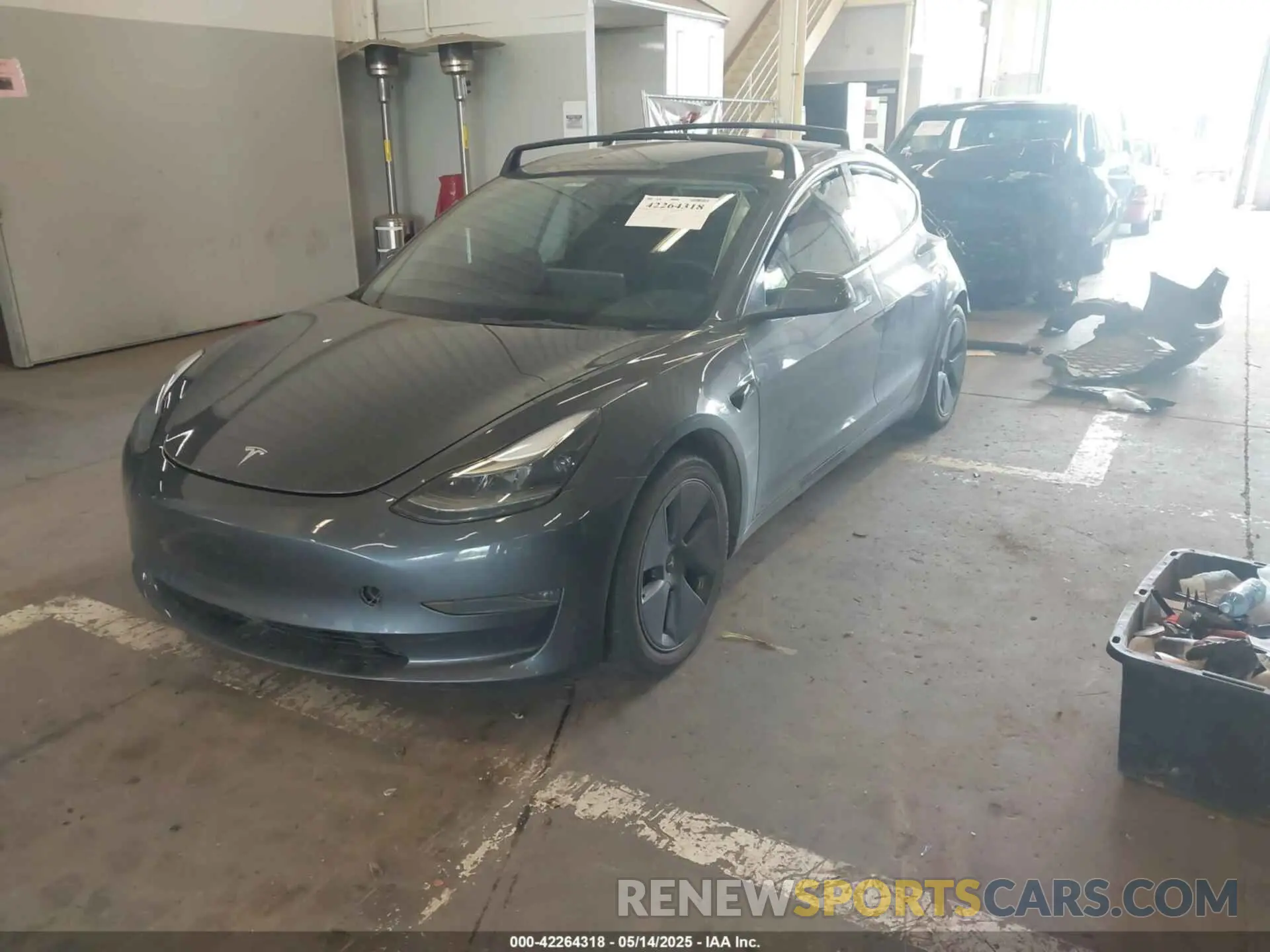 2 fotografías del automóvil dañado 5YJ3E1EBXPF468036 TESLA MODEL 3 2023