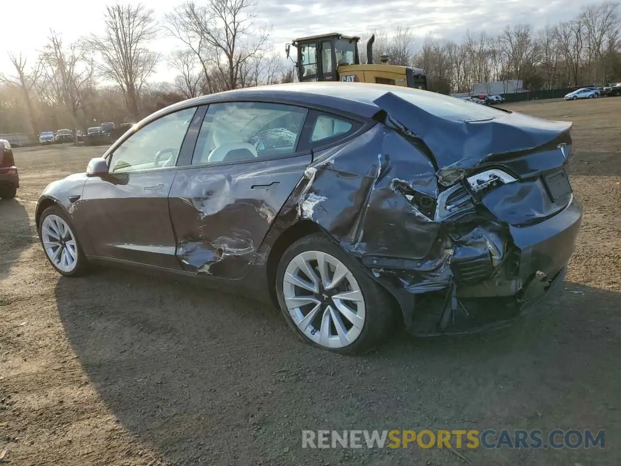2 fotografías del automóvil dañado 5YJ3E1EBXPF660900 TESLA MODEL 3 2023