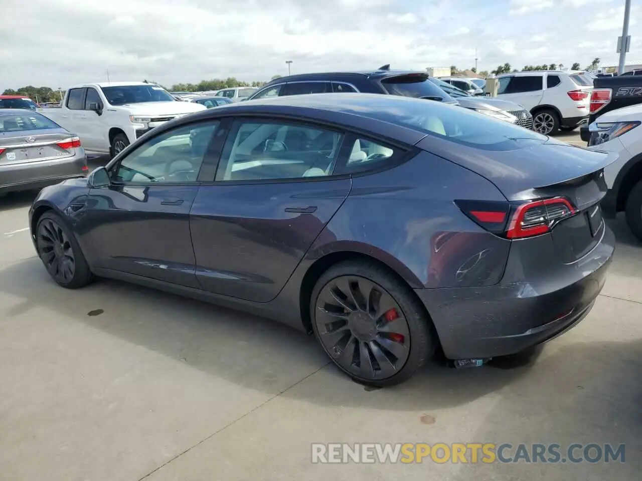 2 fotografías del automóvil dañado 5YJ3E1EC2PF677330 TESLA MODEL 3 2023