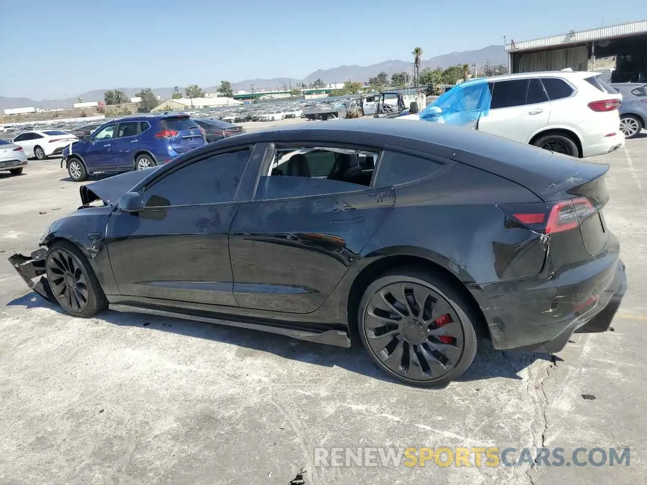 2 fotografías del automóvil dañado 5YJ3E1EC4PF693819 TESLA MODEL 3 2023