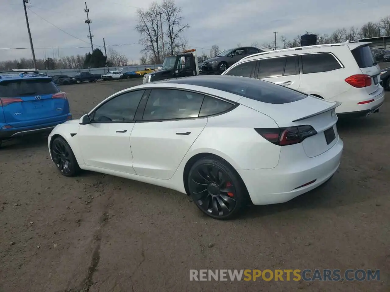 2 fotografías del automóvil dañado 5YJ3E1EC6PF399676 TESLA MODEL 3 2023