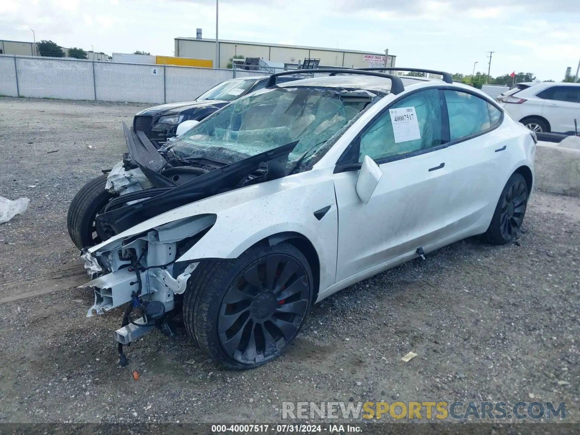2 fotografías del automóvil dañado 5YJ3E1EC8PF585171 TESLA MODEL 3 2023