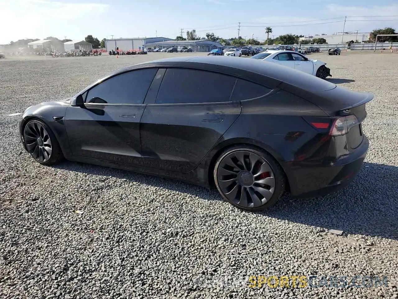 2 fotografías del automóvil dañado 5YJ3E1EC9PF414218 TESLA MODEL 3 2023