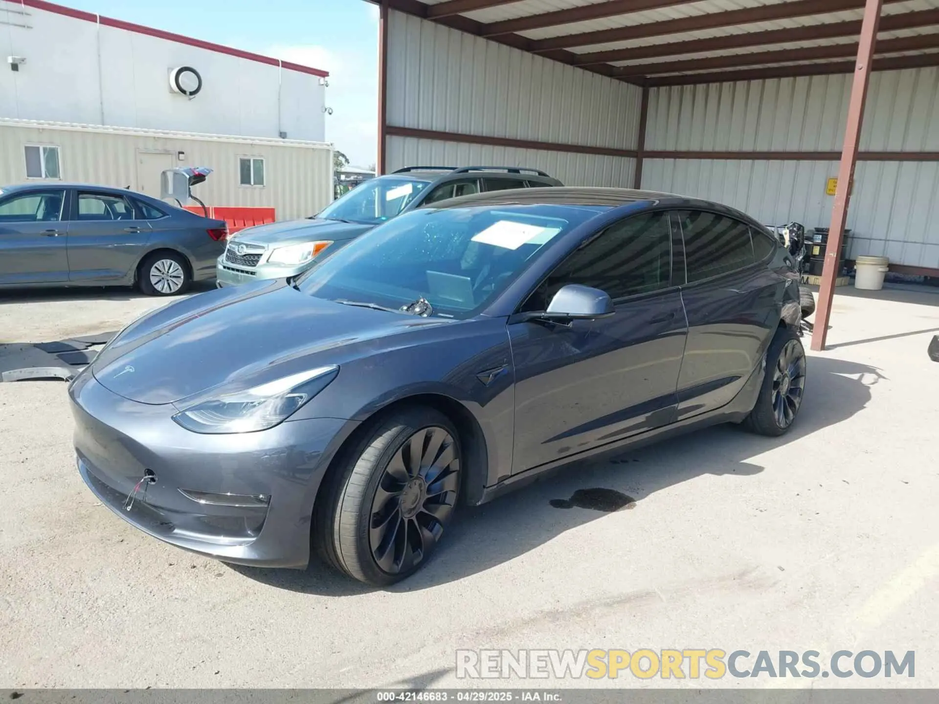 2 fotografías del automóvil dañado 5YJ3E1ECXPF410212 TESLA MODEL 3 2023