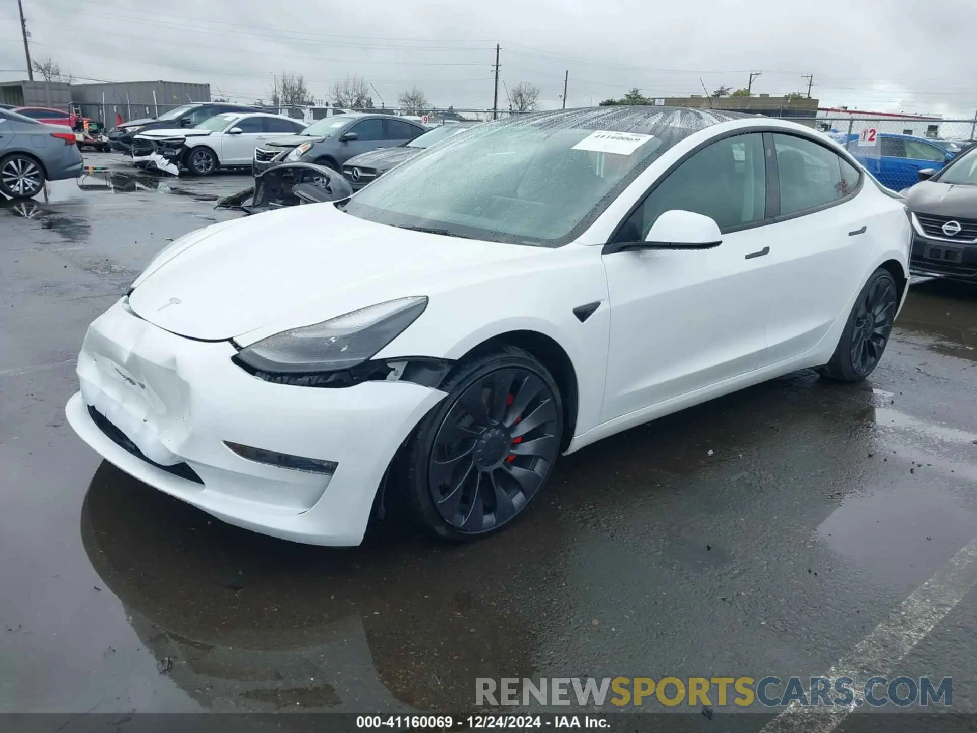2 fotografías del automóvil dañado 5YJ3E1ECXPF582174 TESLA MODEL 3 2023