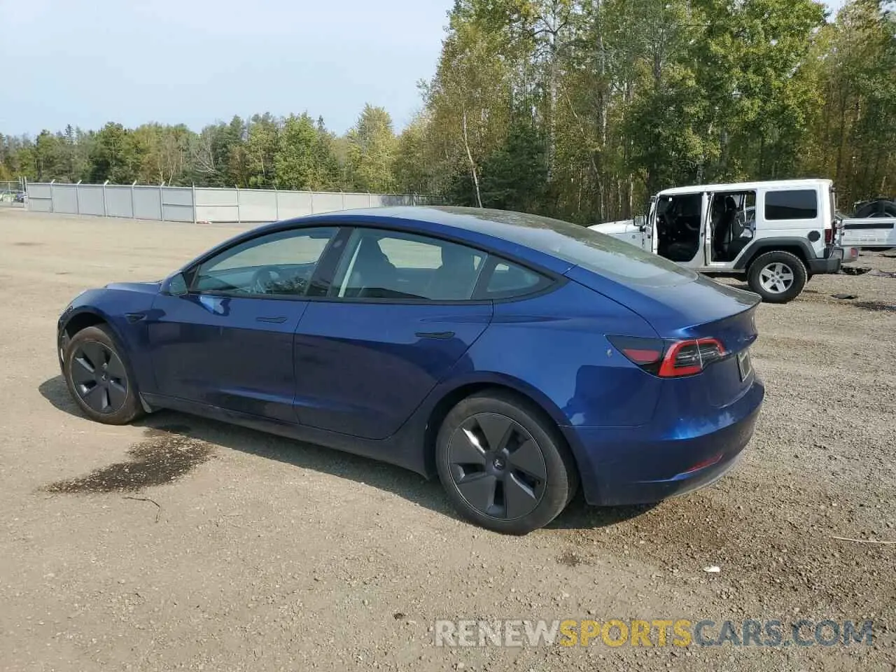 2 fotografías del automóvil dañado LRW3E1FA4PC920949 TESLA MODEL 3 2023