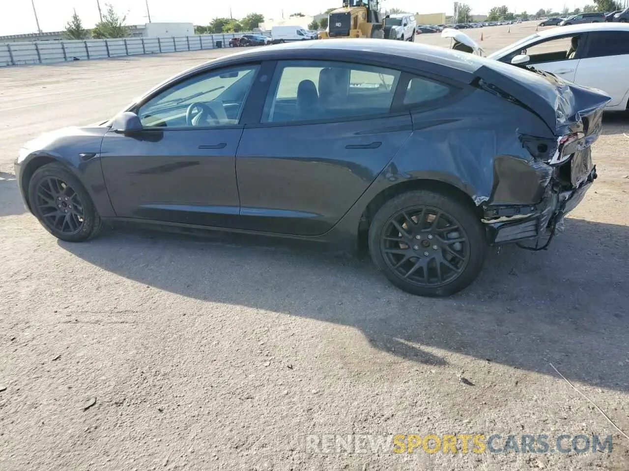 2 fotografías del automóvil dañado 5YJ3E1EA0RF742998 TESLA MODEL 3 2024