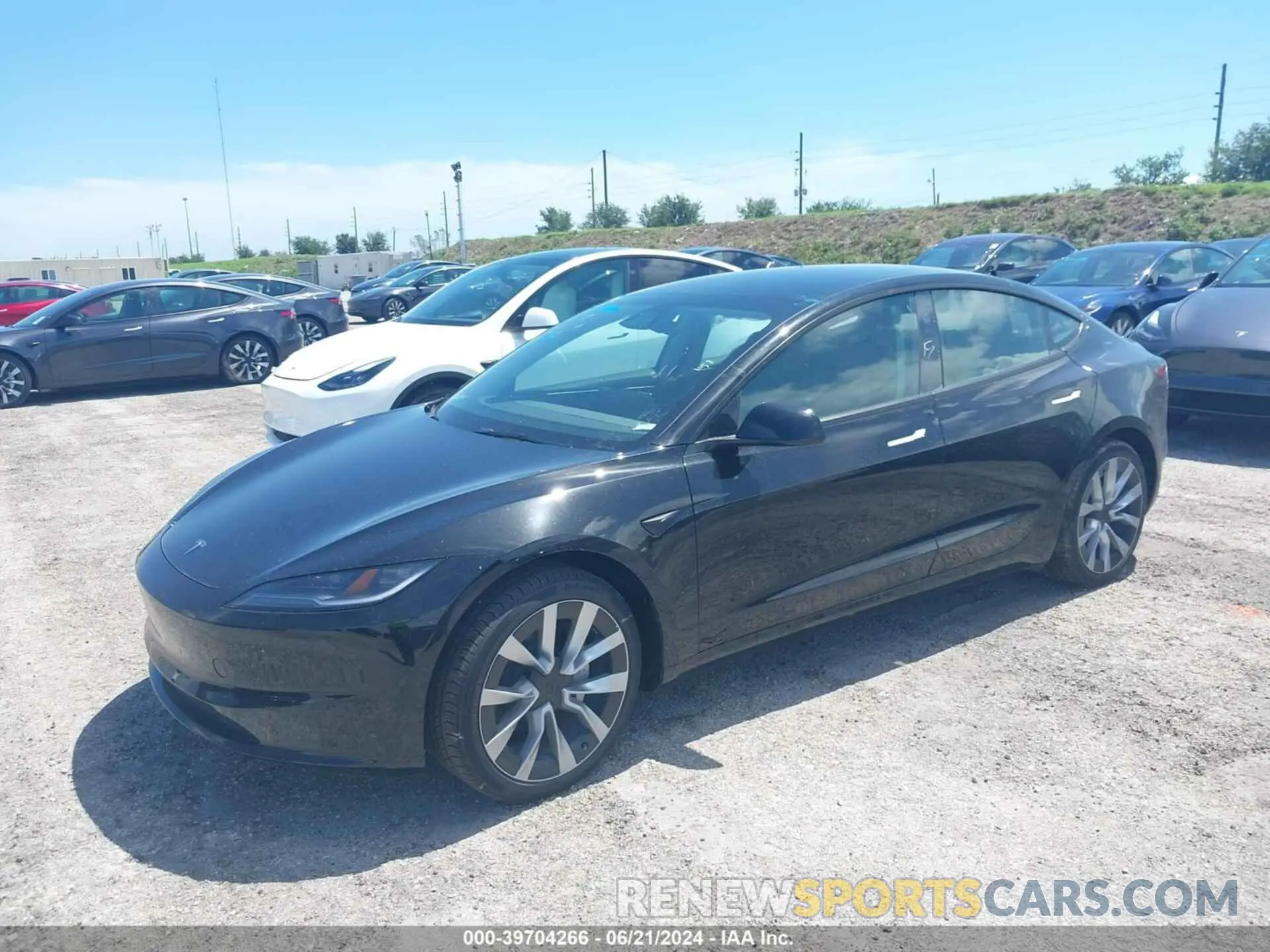 2 fotografías del automóvil dañado 5YJ3E1EA0RF752477 TESLA MODEL 3 2024