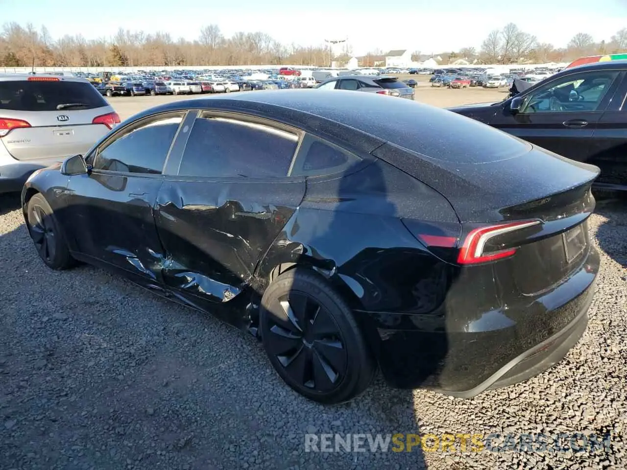 2 fotografías del automóvil dañado 5YJ3E1EA0RF801662 TESLA MODEL 3 2024