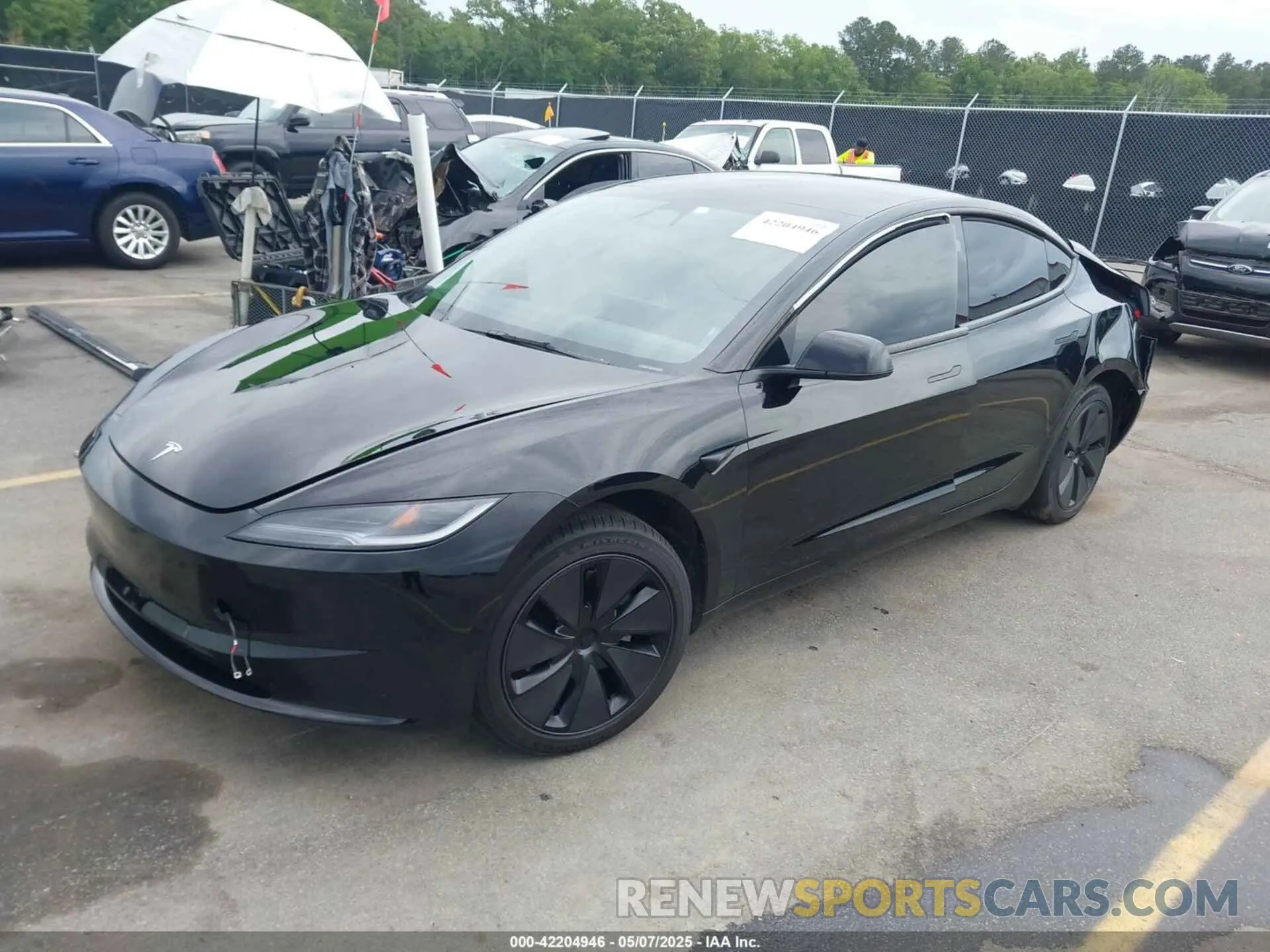 2 fotografías del automóvil dañado 5YJ3E1EA0RF856726 TESLA MODEL 3 2024