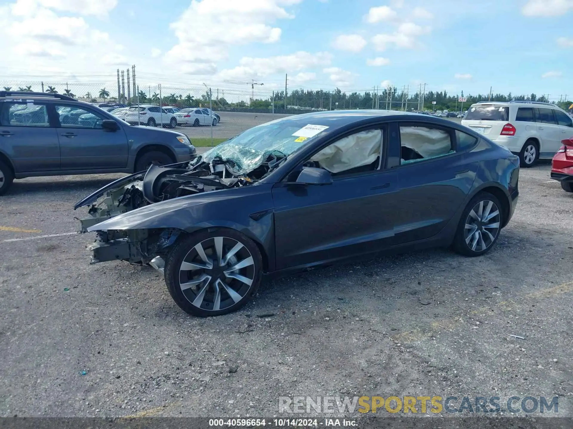 2 fotografías del automóvil dañado 5YJ3E1EA2RF751069 TESLA MODEL 3 2024
