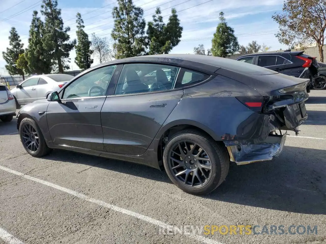 2 fotografías del automóvil dañado 5YJ3E1EA3RF721577 TESLA MODEL 3 2024