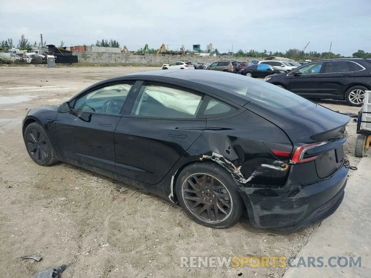 2 fotografías del automóvil dañado 5YJ3E1EA3RF734877 TESLA MODEL 3 2024