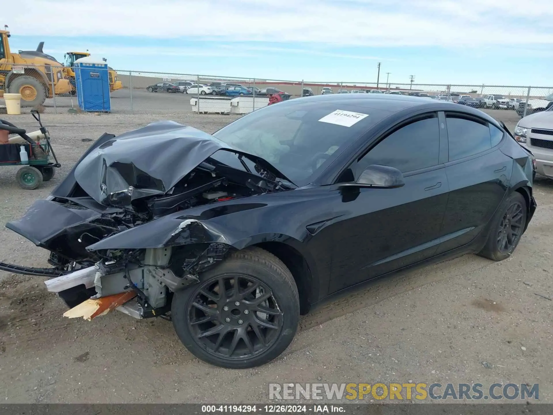 2 fotografías del automóvil dañado 5YJ3E1EA3RF871060 TESLA MODEL 3 2024