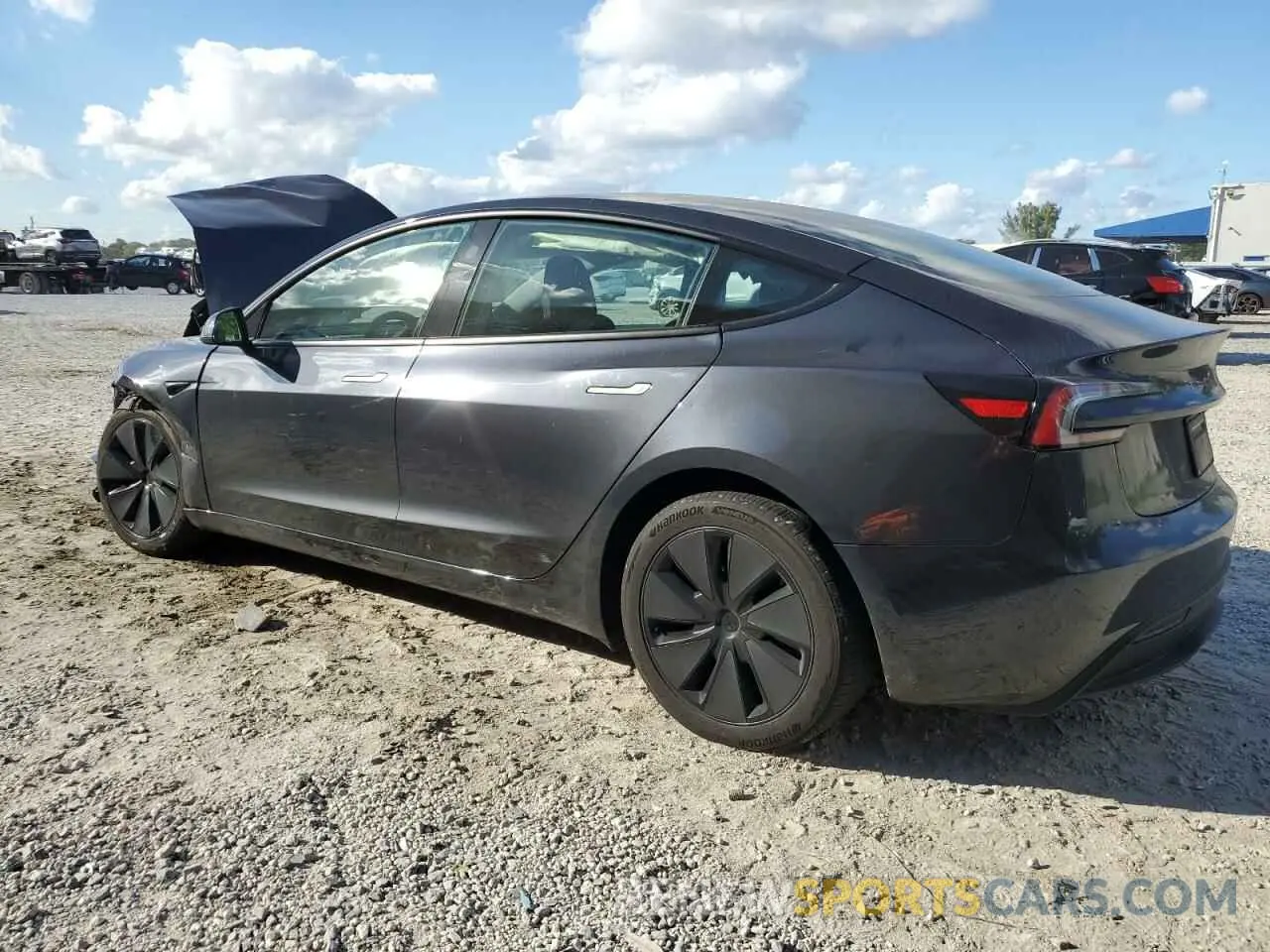 2 fotografías del automóvil dañado 5YJ3E1EA4RF727260 TESLA MODEL 3 2024